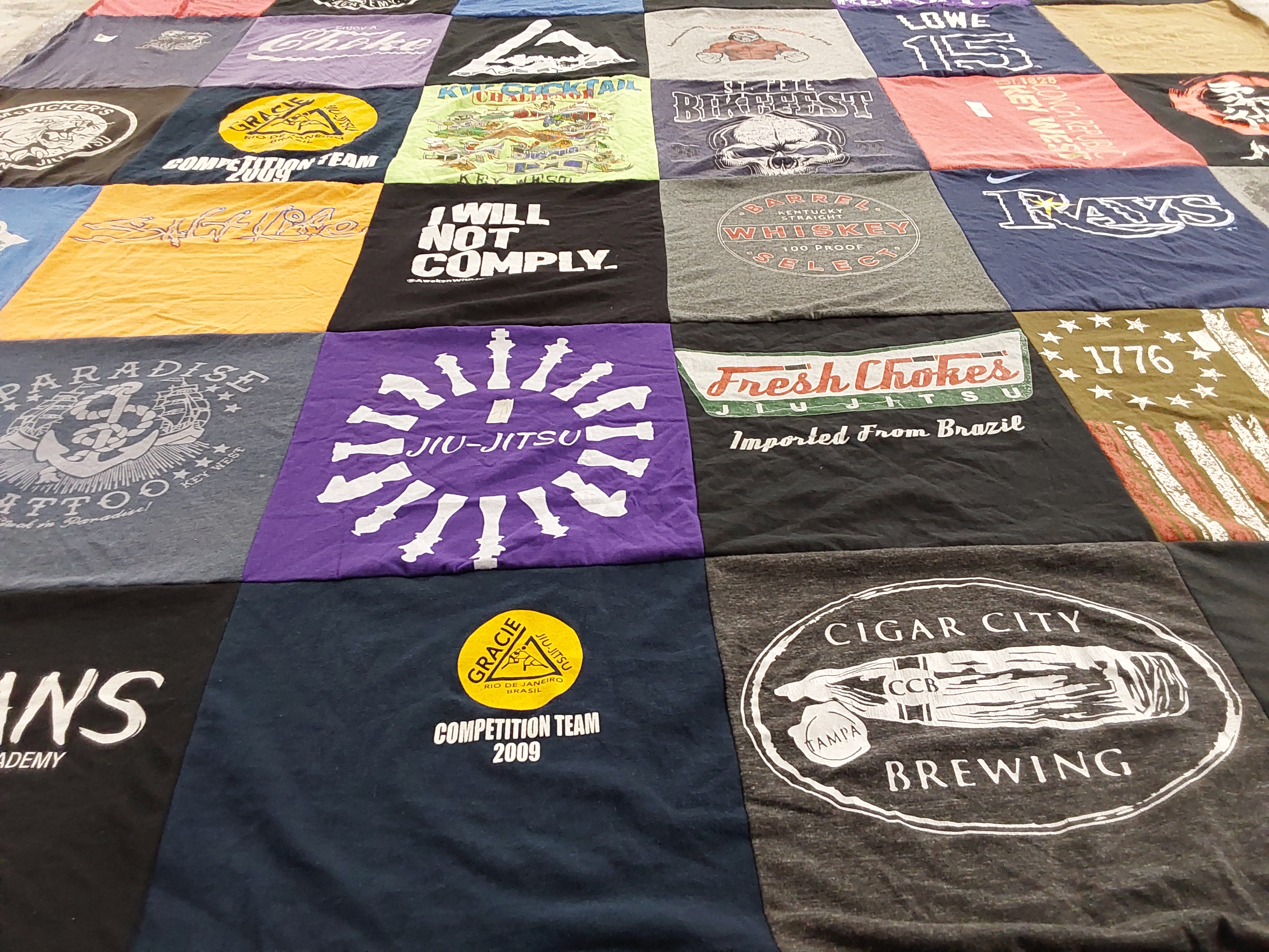 T-shirt quilt with jiu-jitsu, tattoo themes by Michelle from FL