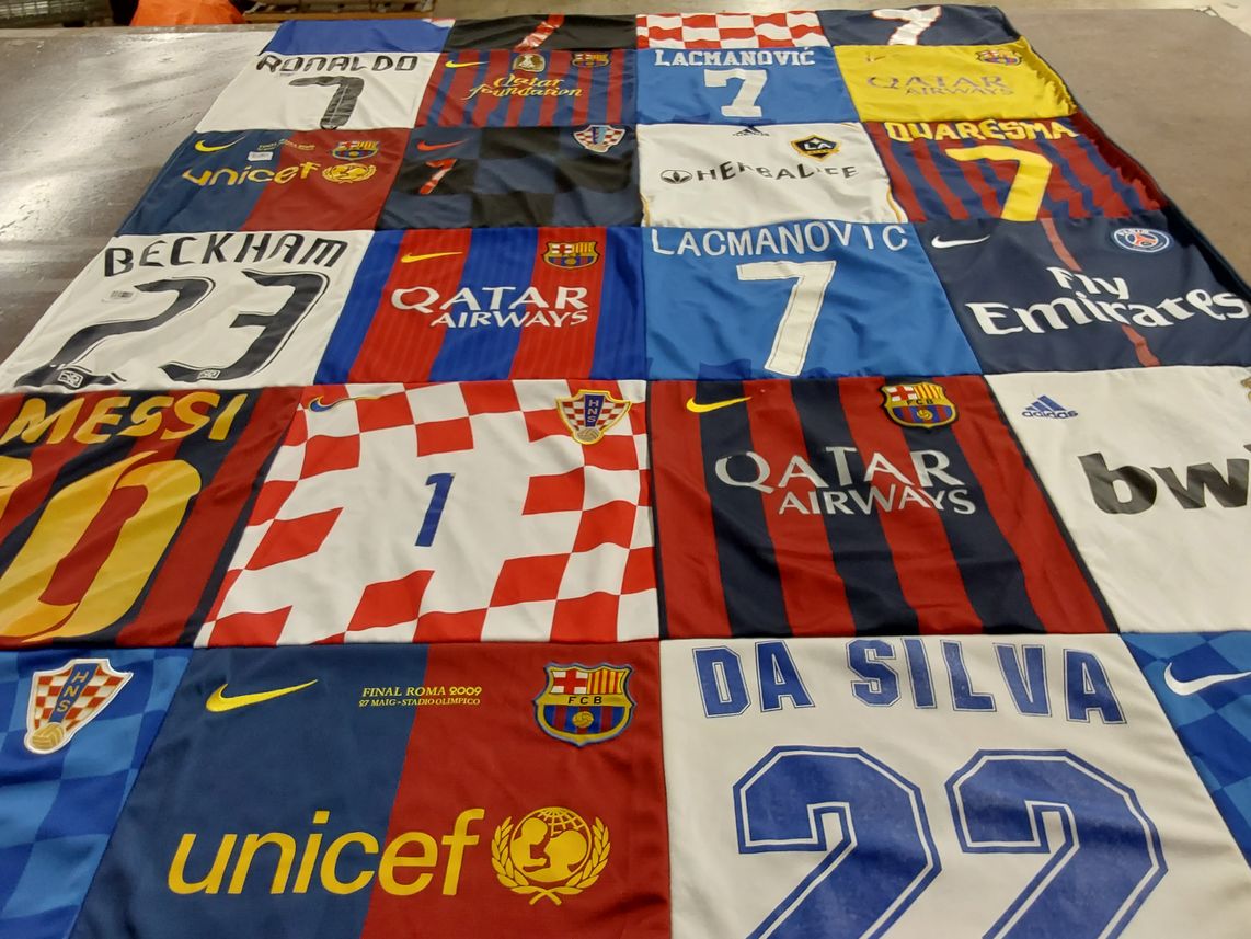 T-shirt quilt with soccer, football themes by Jocelyn from NH
