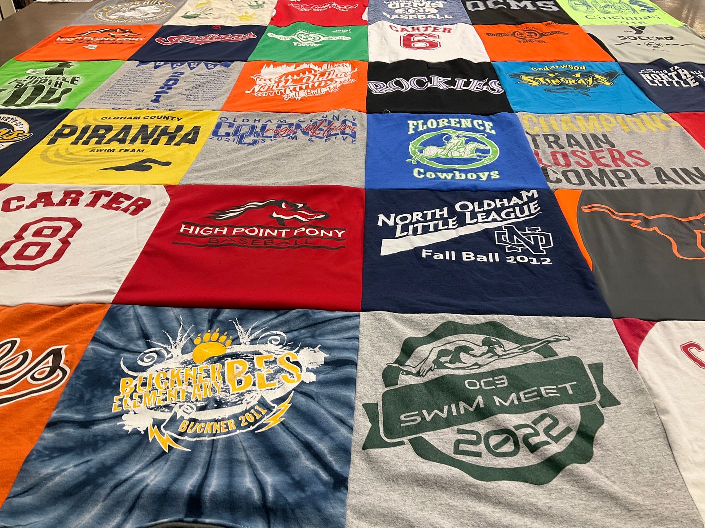 T-shirt quilt with swimming, baseball themes by Alexander from KY