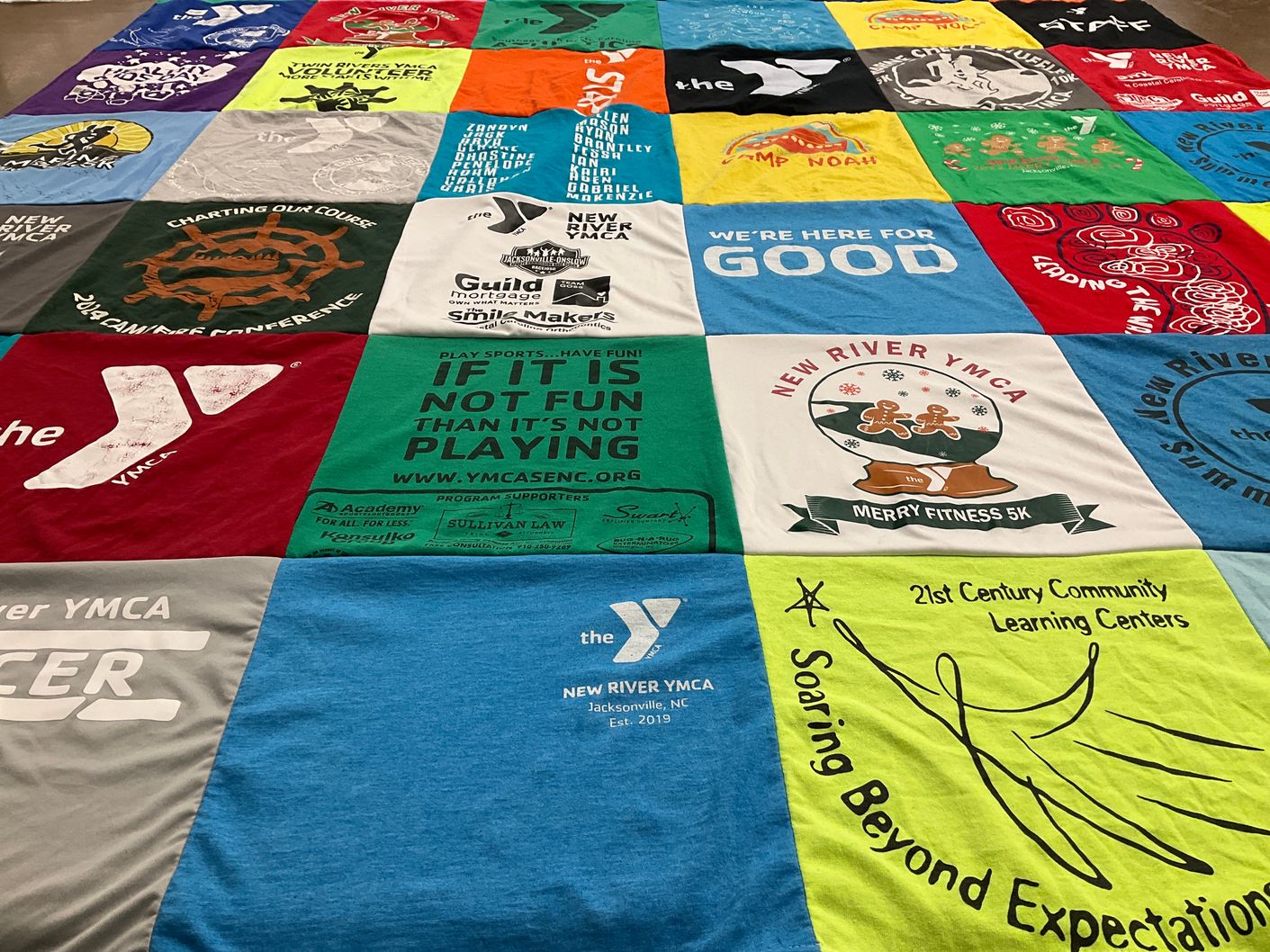 T-shirt quilt with community service, fitness themes by Katie from WV
