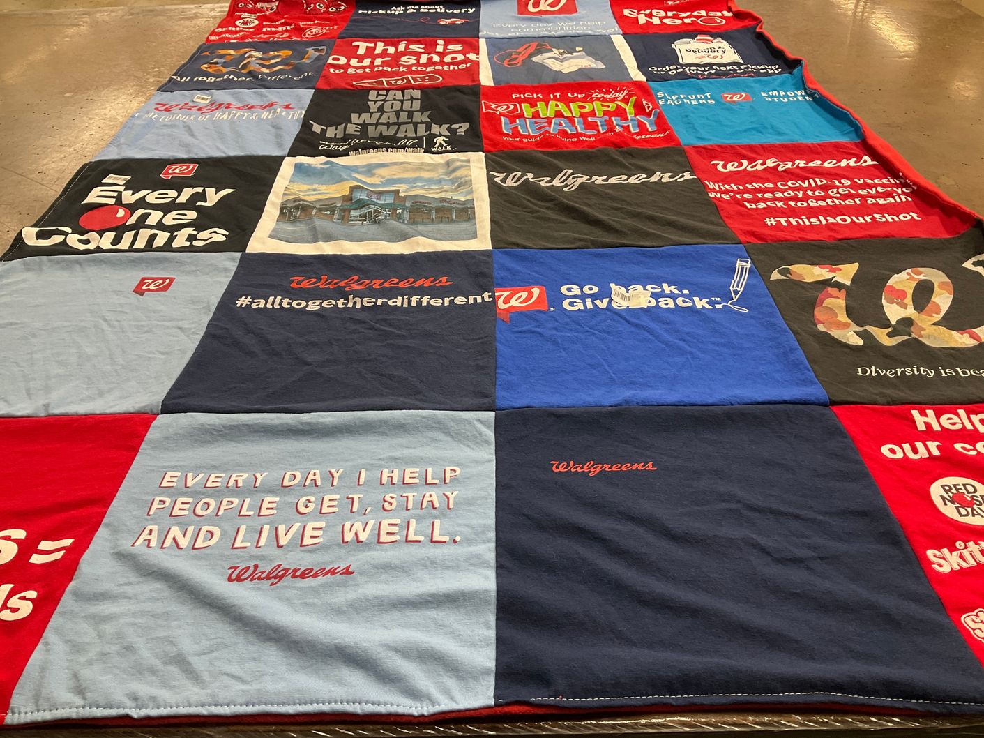 T-shirt quilt with healthcare, community service themes by Laurie from IL