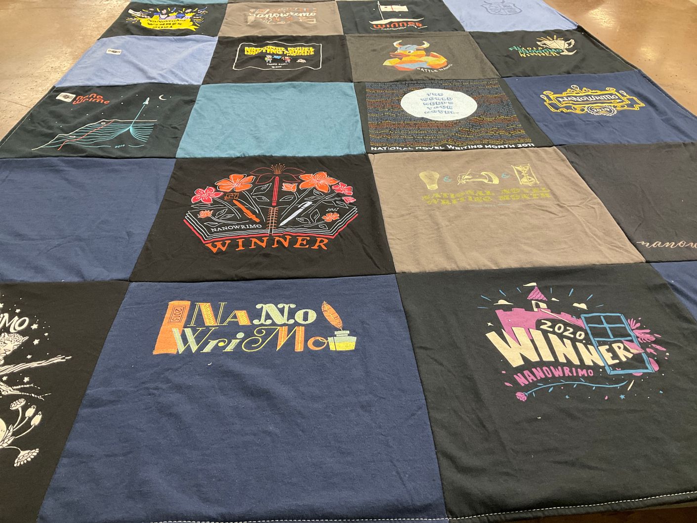 T-shirt quilt with writing themes by Sarah from WA