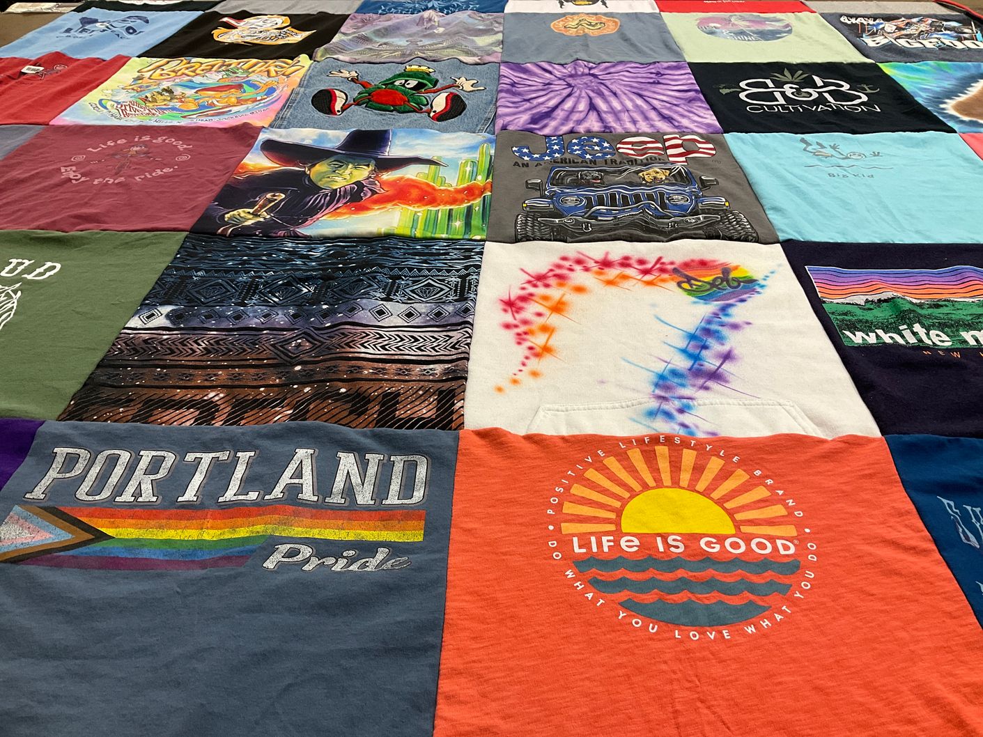 T-shirt quilt with positive lifestyle, travel themes by Brenda from VA