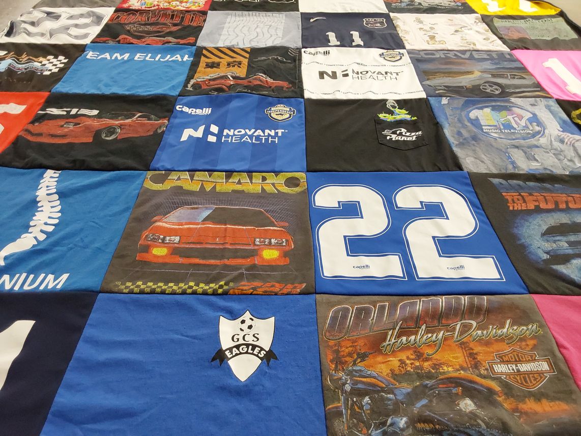 T-shirt quilt with cars, healthcare themes by Stacy from NC