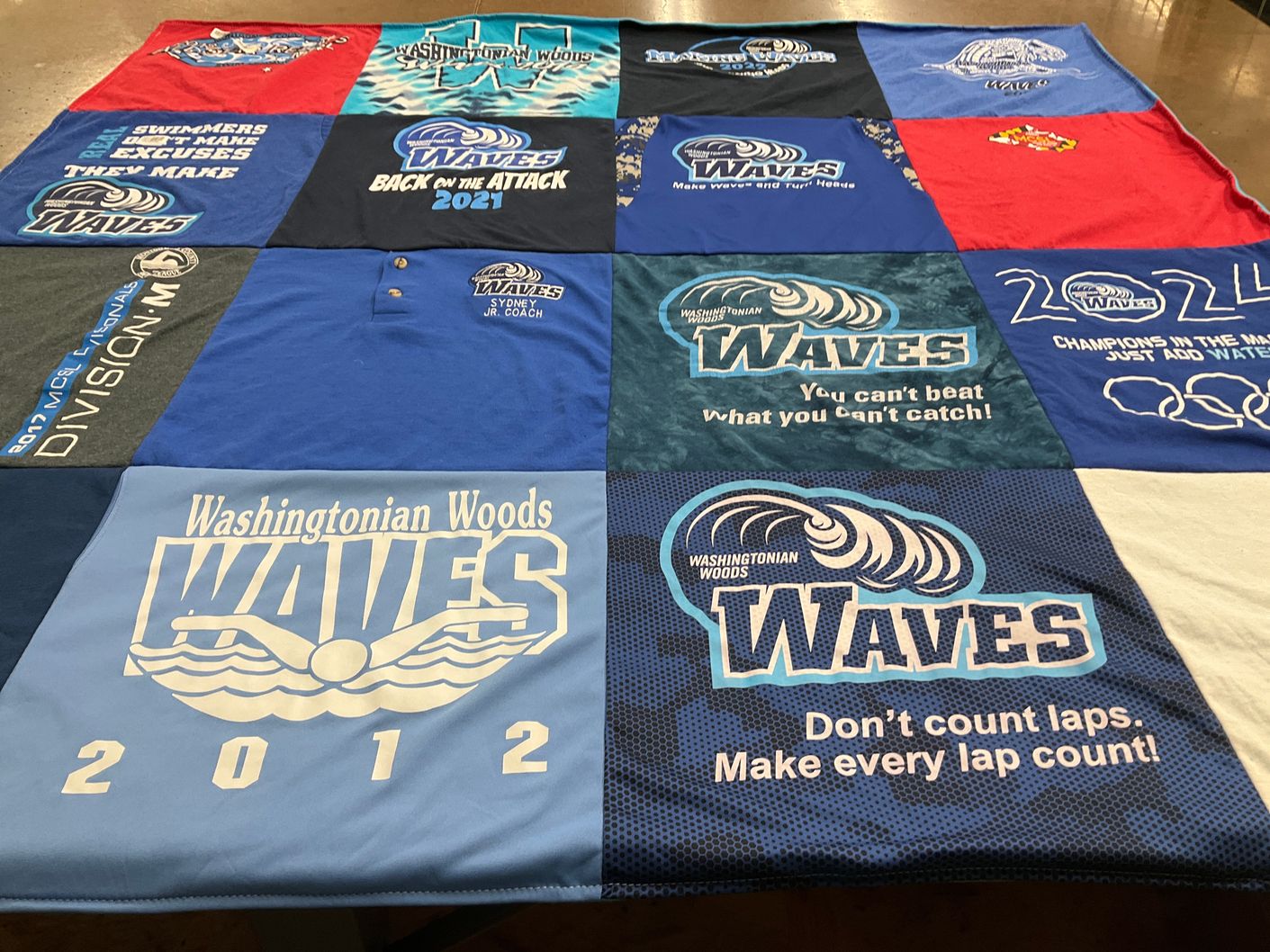 T-shirt quilt with swimming, team sports themes by Erin from MD