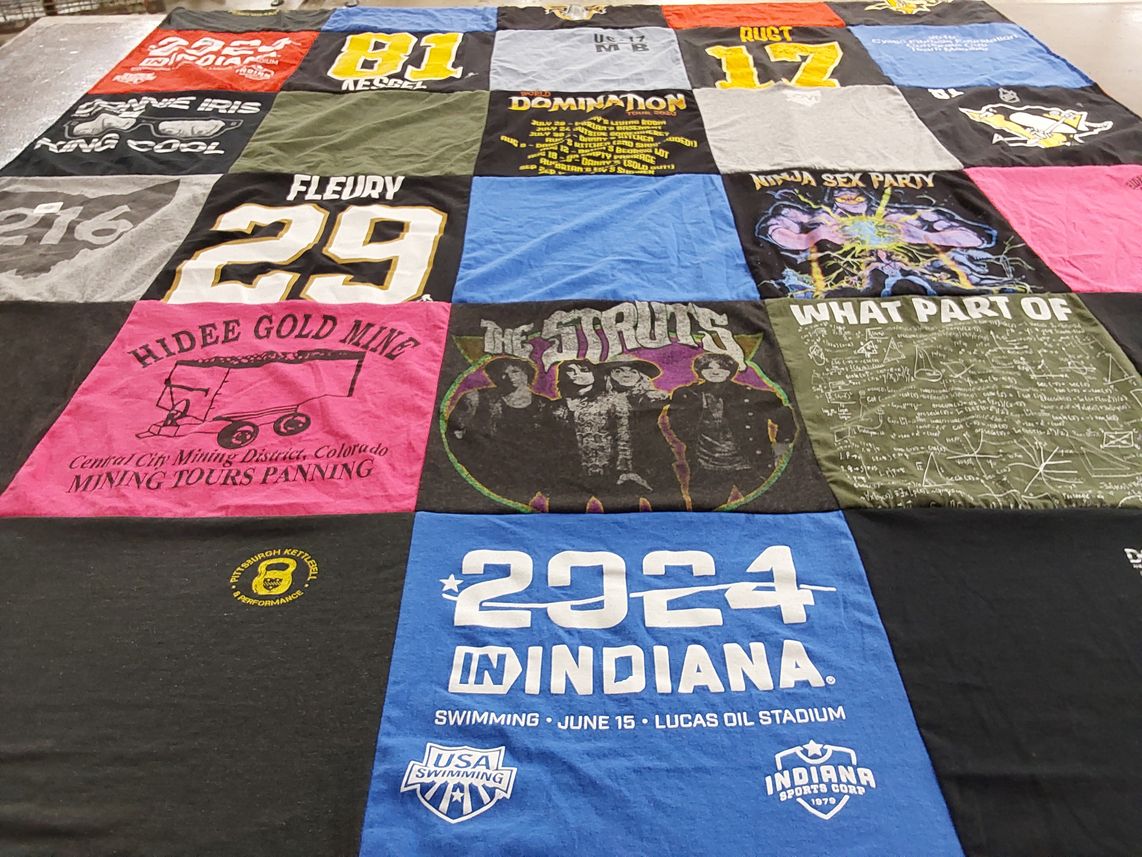 T-shirt quilt with swimming, music themes by Aaron from PA