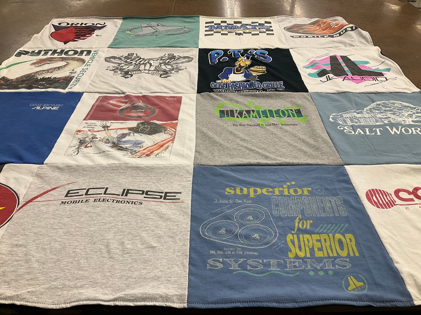 T-shirt quilt with automotive, electronics themes by Dennis from NC
