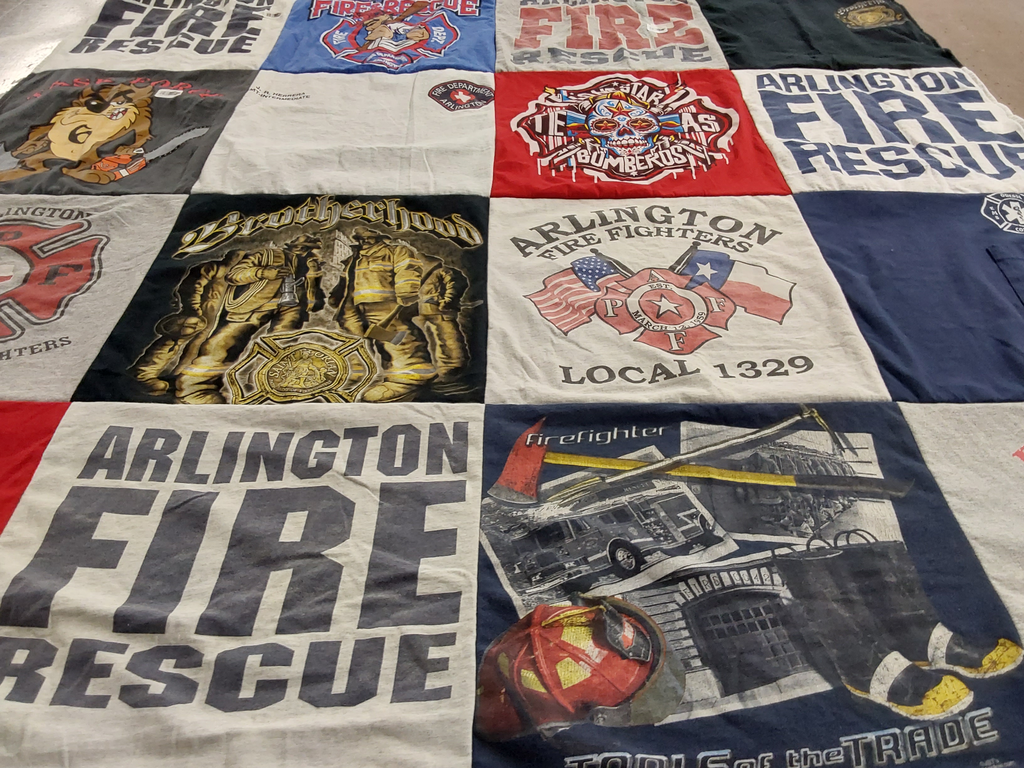 T-shirt quilt with firefighting, community service themes by Juan from TX