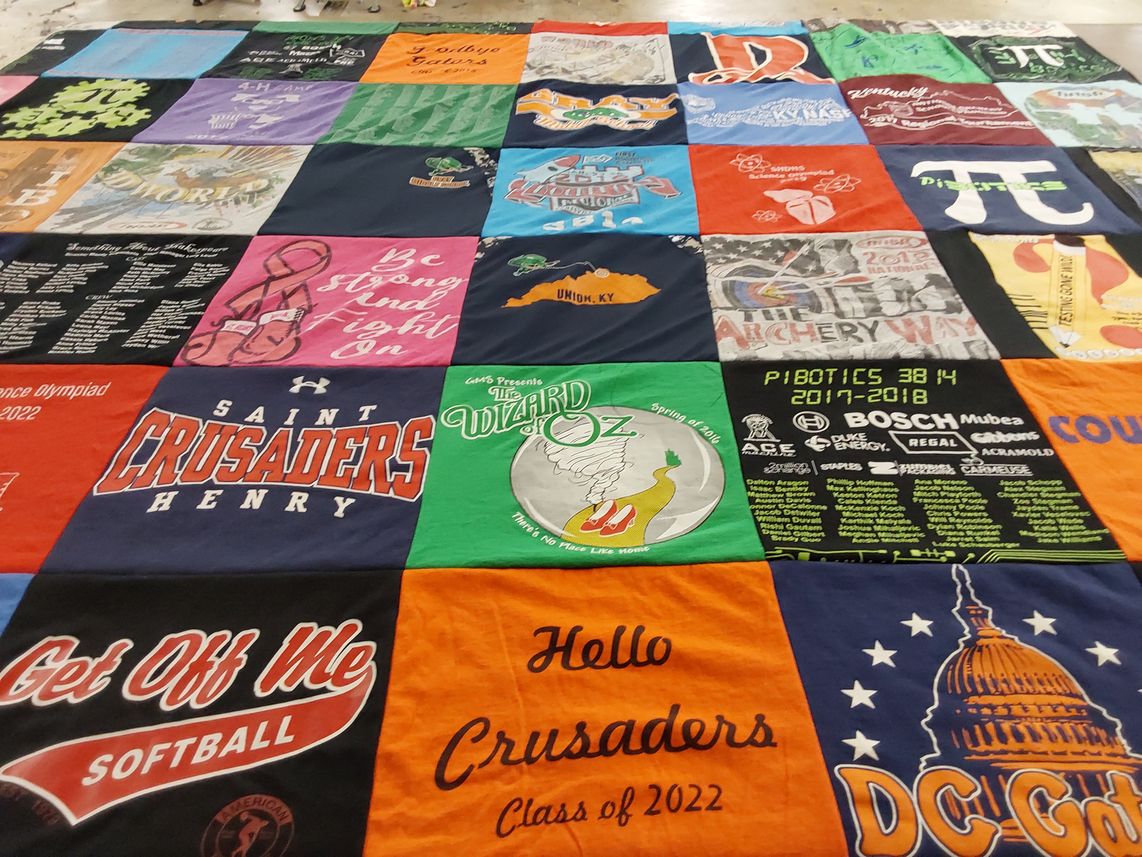 T-shirt quilt featuring saint henry district high school softball team, pibotics team by Melissa from KY
