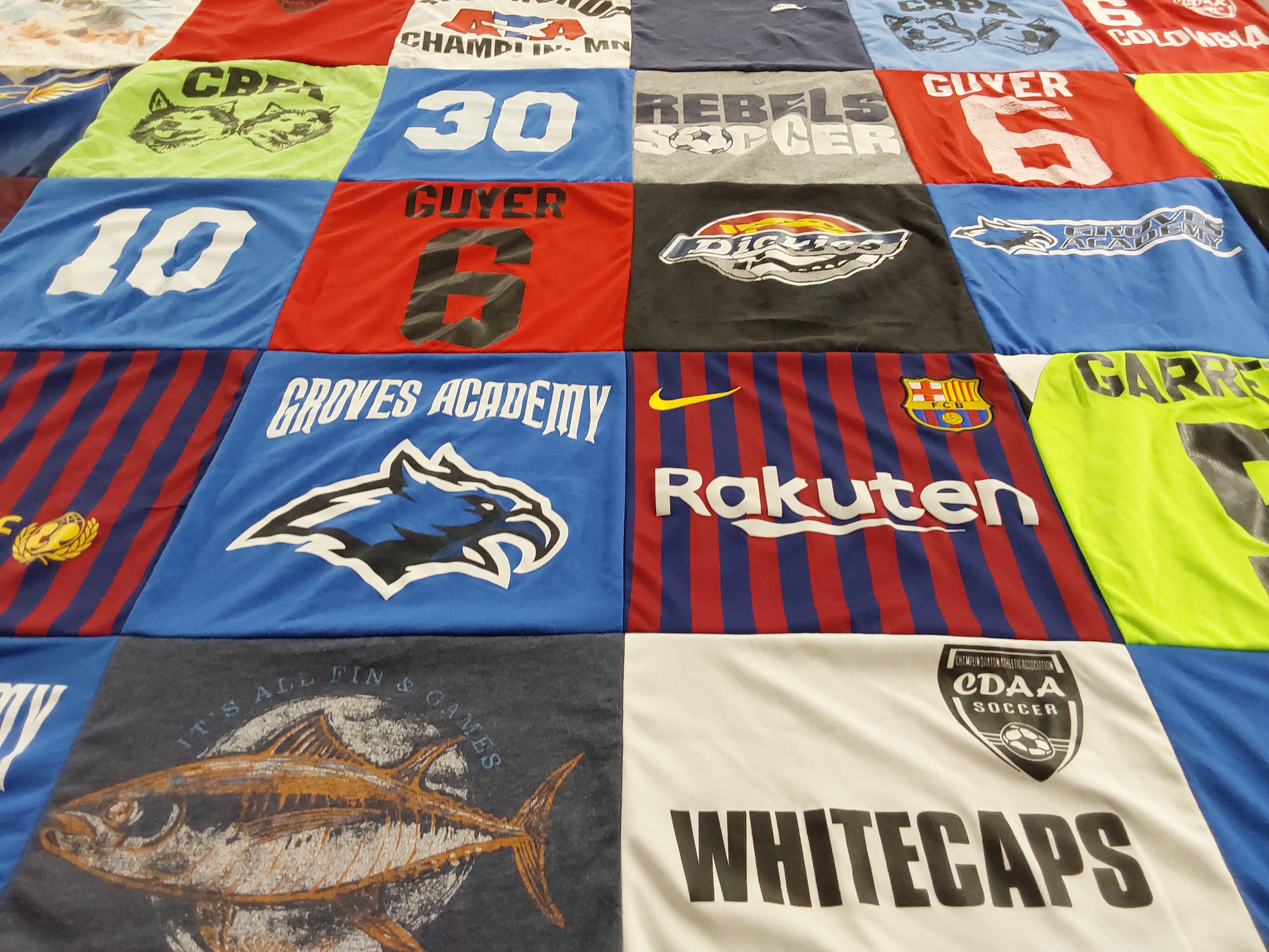 T-shirt quilt featuring whitecaps by Beth from MN