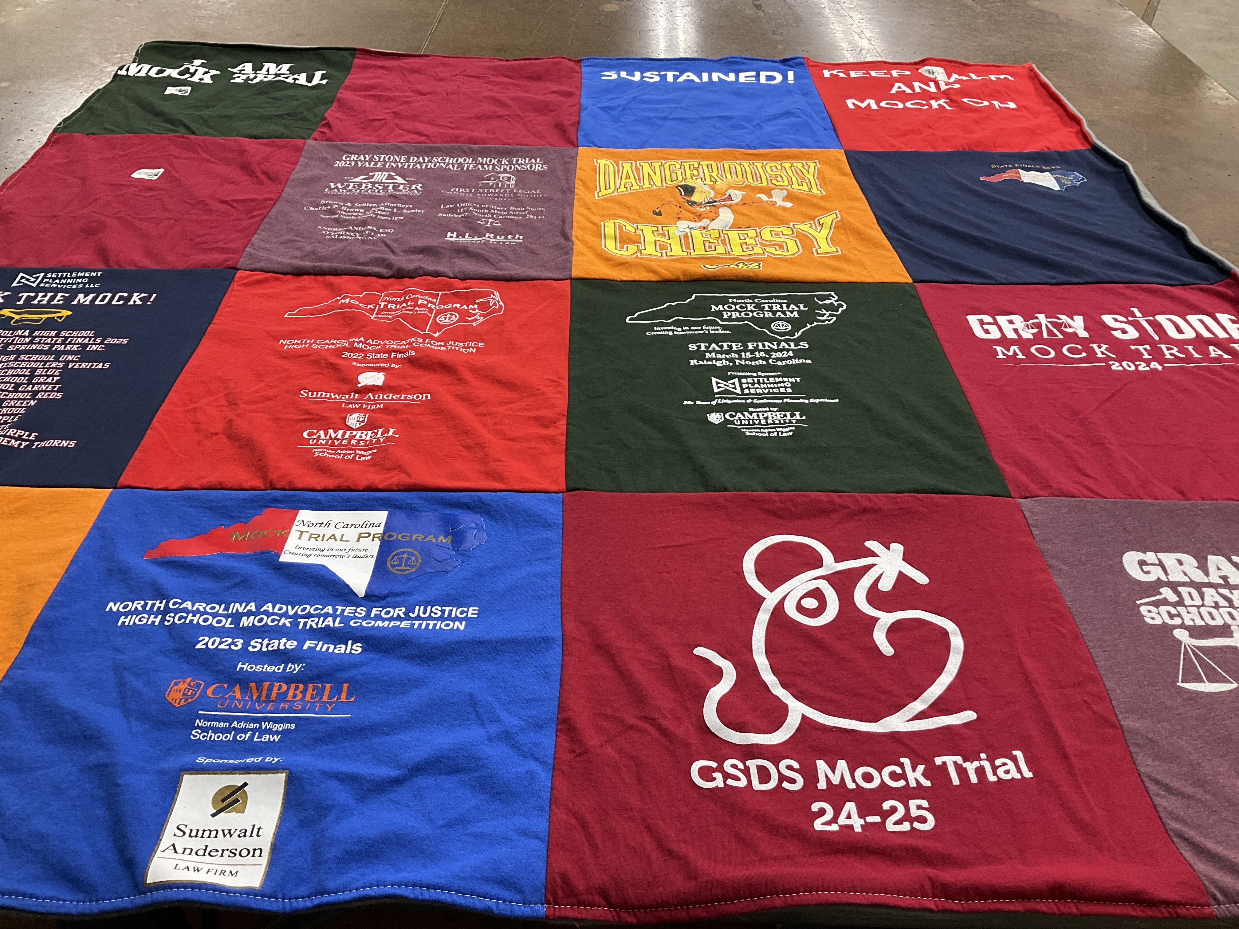 T-shirt quilt featuring gray stone day school mock trial by Brian from NC