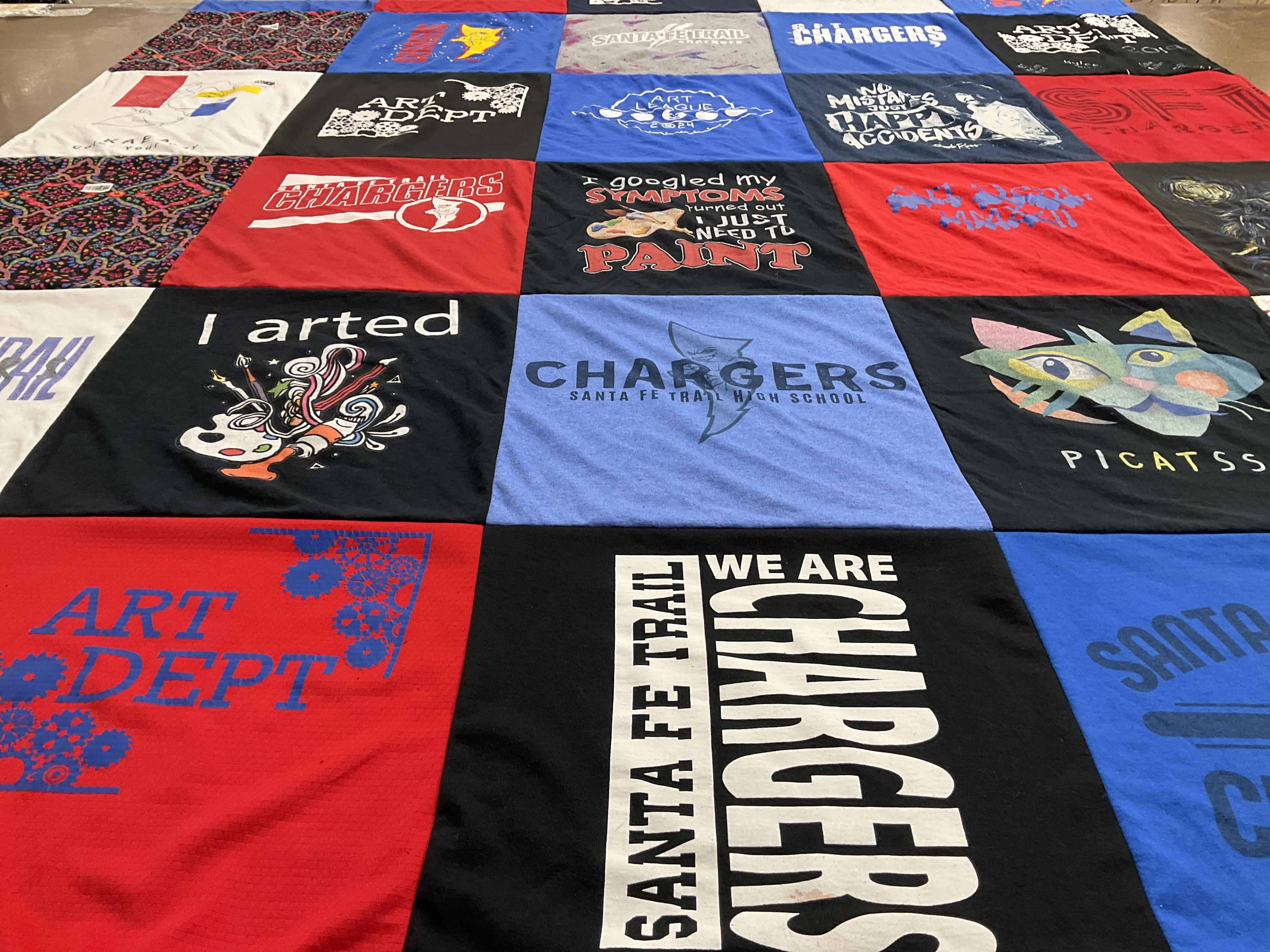 T-shirt quilt featuring santa fe trail high school chargers by Stephanie from KS