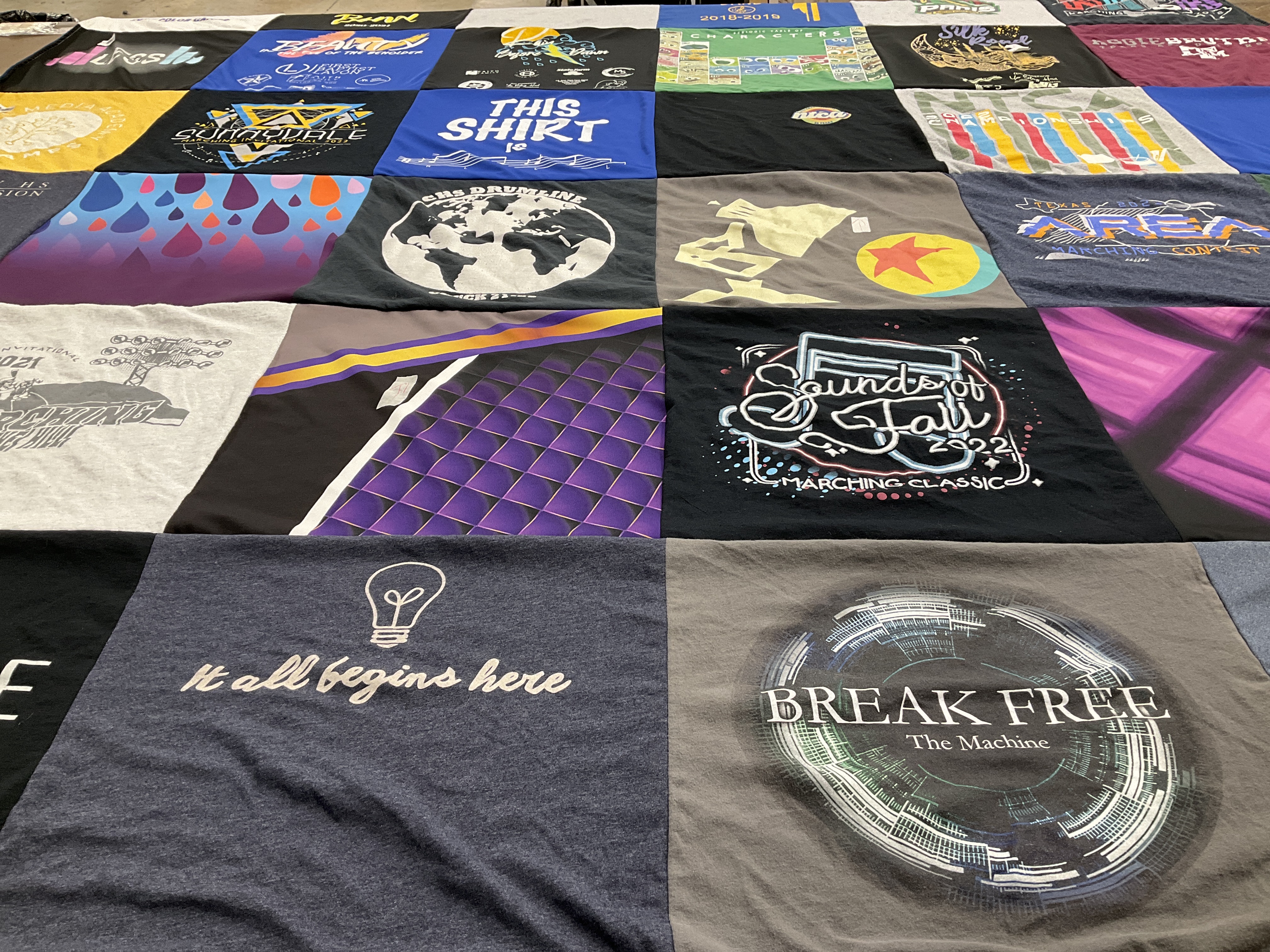 T-shirt quilt with music, marching band themes by Pam from TX