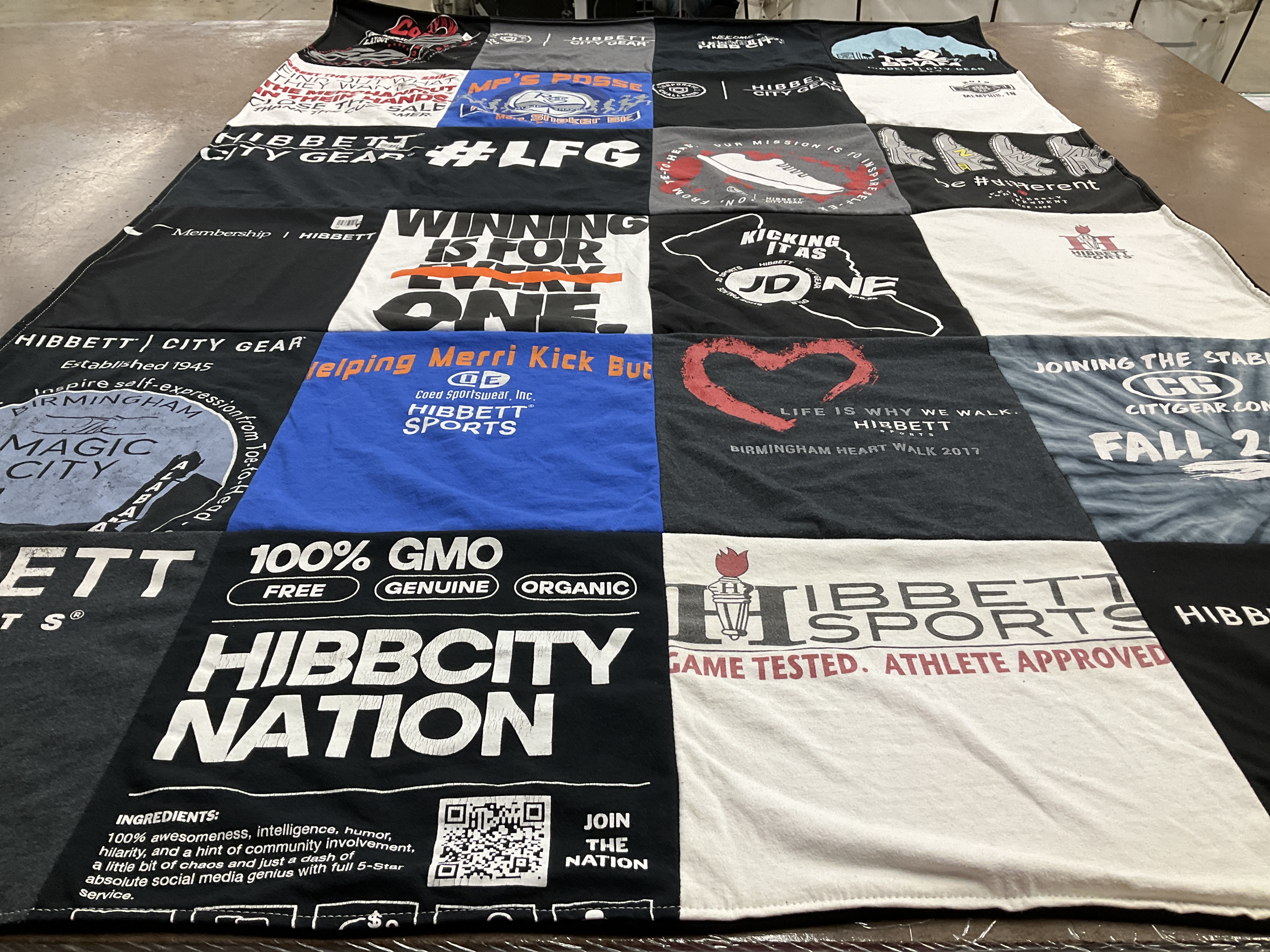 T-shirt quilt with sports, community service themes by Janet from AL