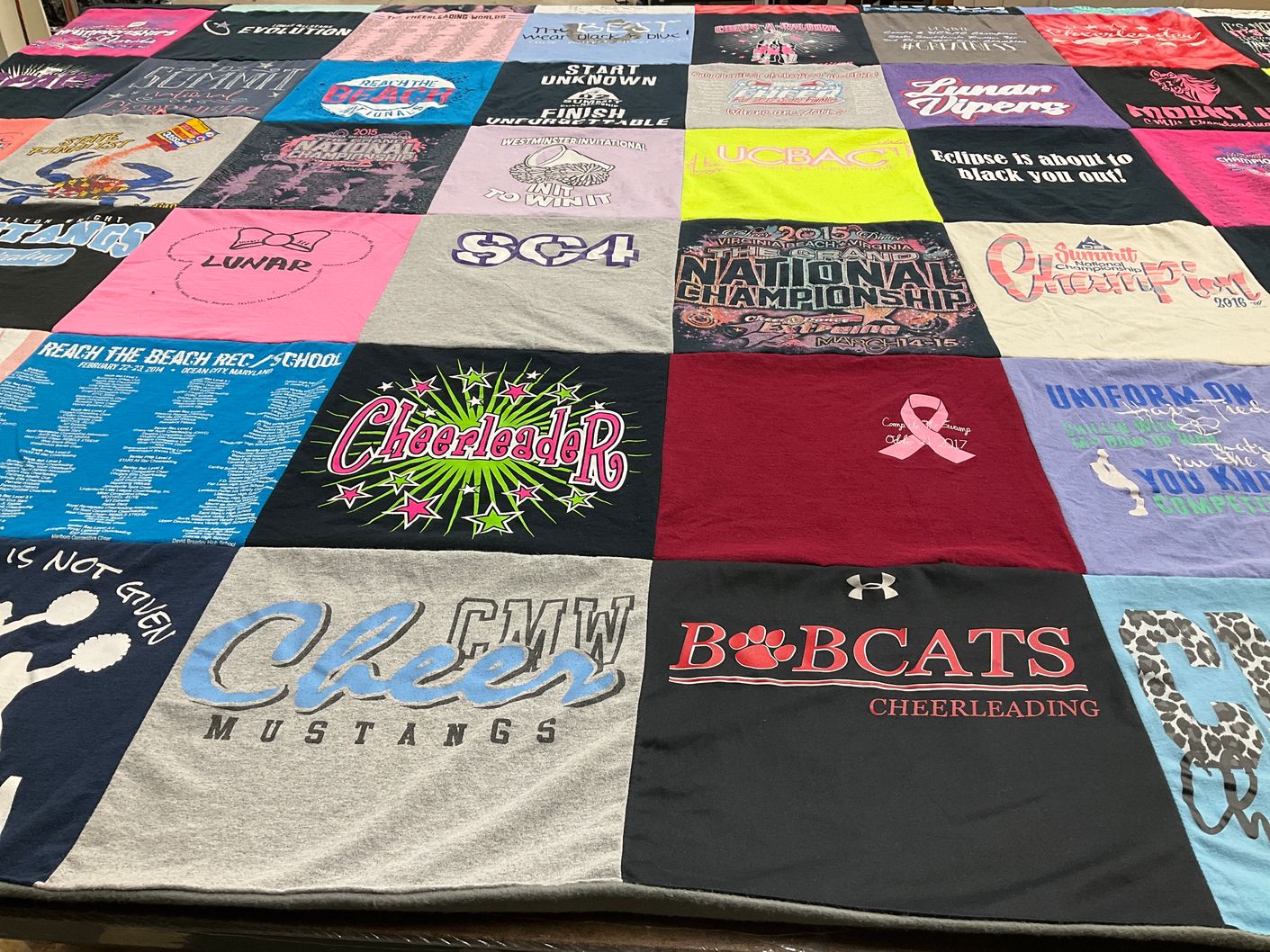 T-shirt quilt featuring bobcats cheerleading, mustangs cheerleading by Alexis from MD