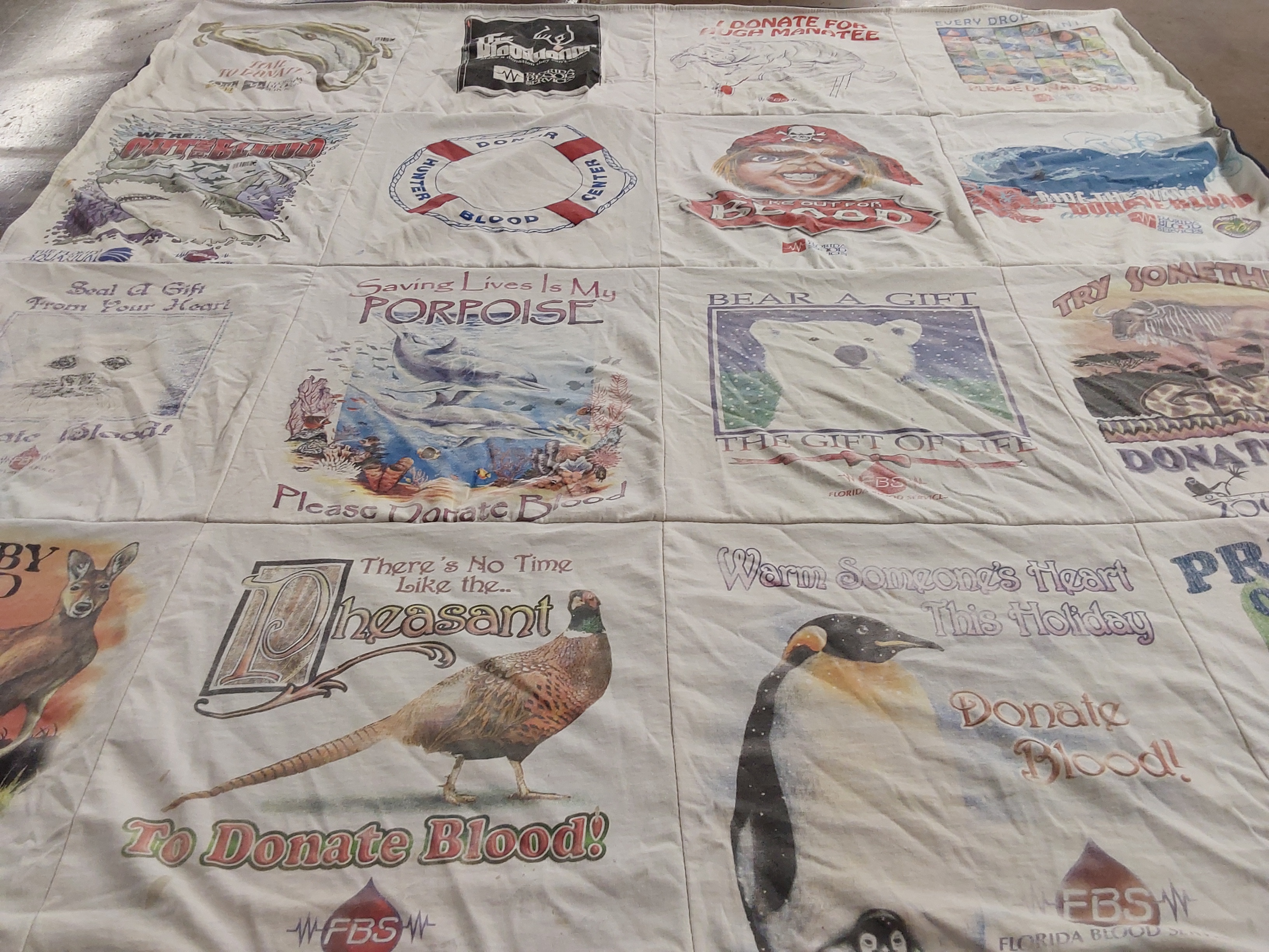 T-shirt quilt with donating blood, wildlife conservation themes by William from FL
