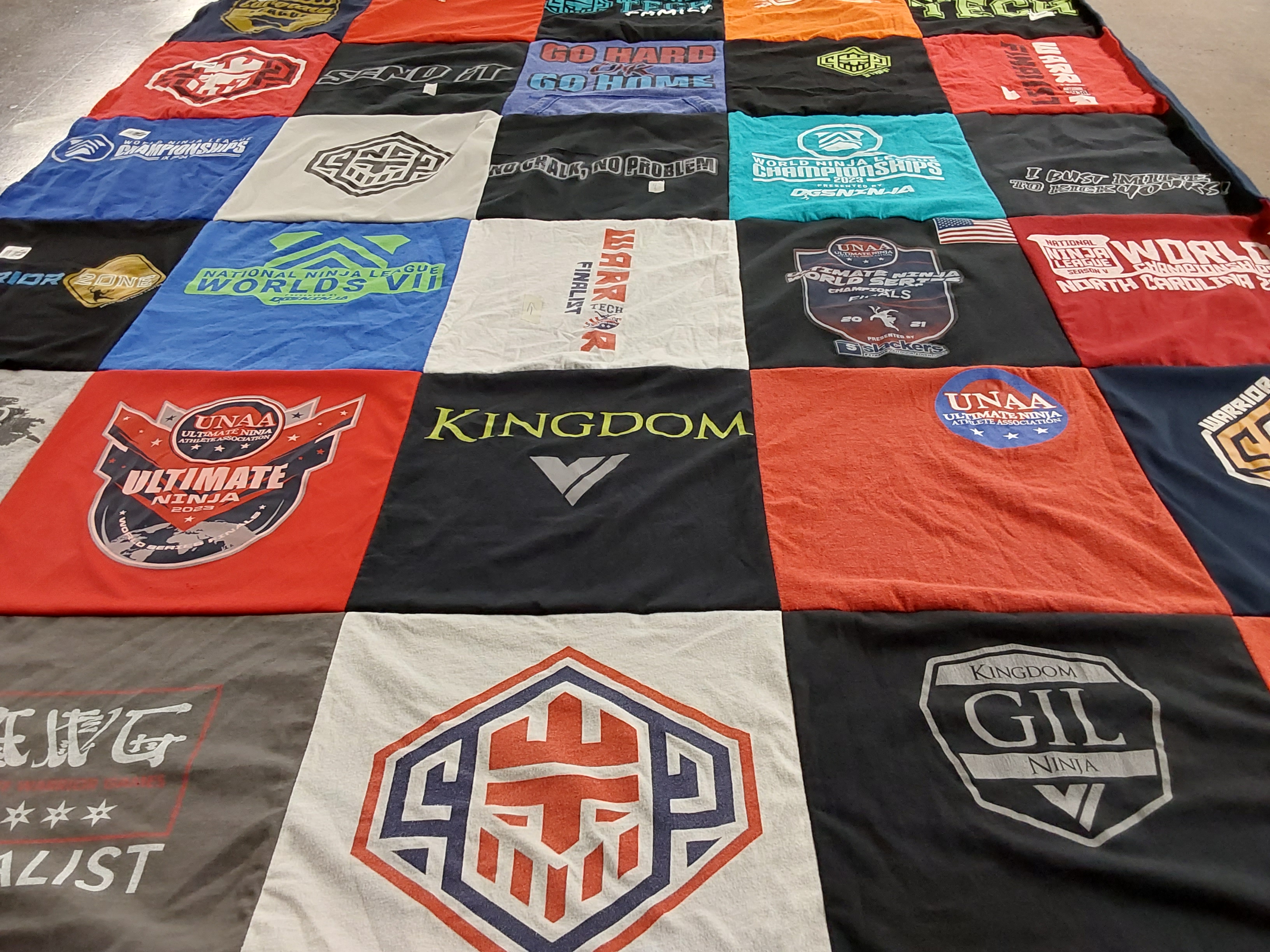 T-shirt quilt with ninja warrior, athletics themes by Amy from NC
