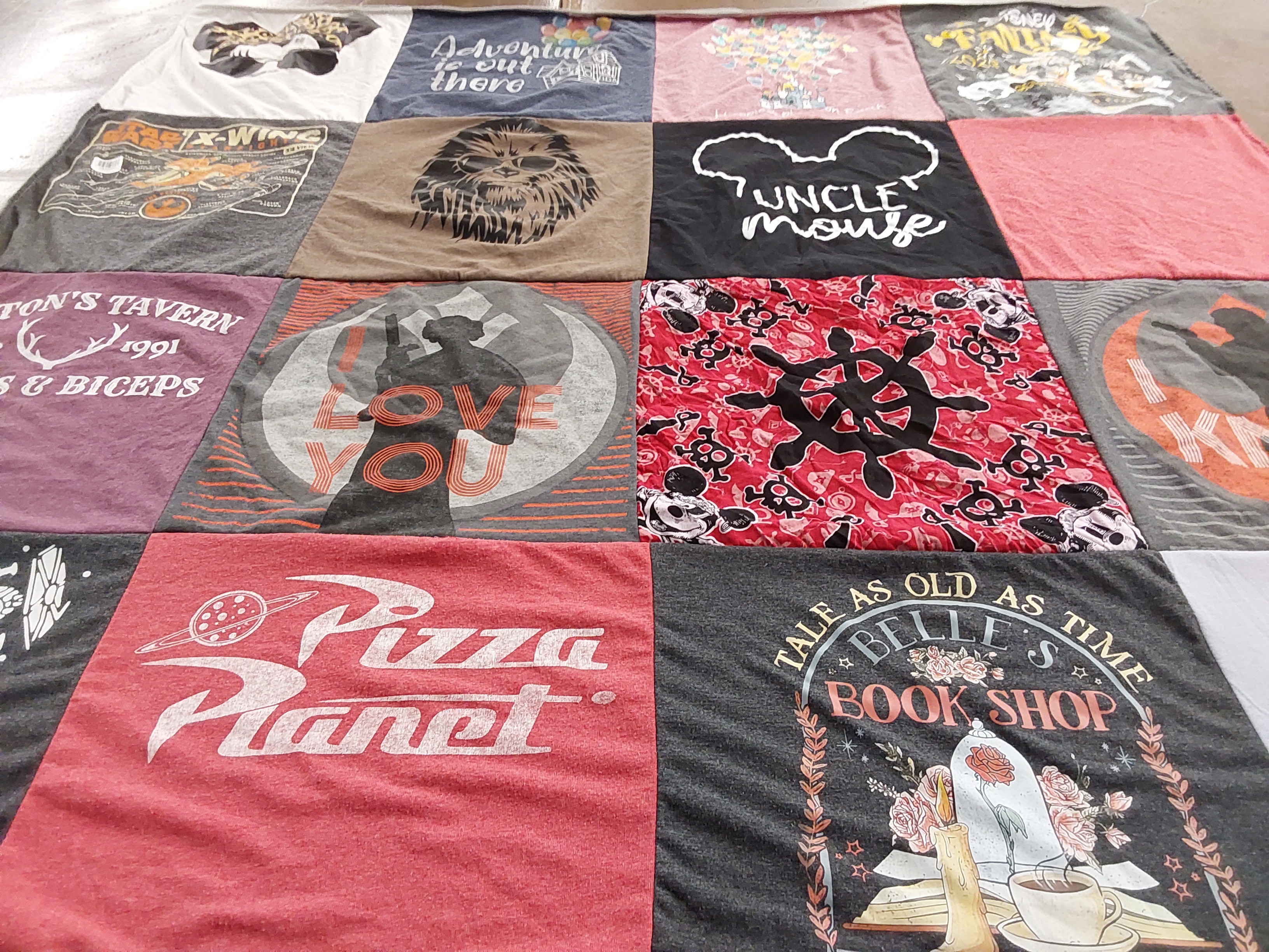 T-shirt quilt with movies, books themes by Maggie from NC