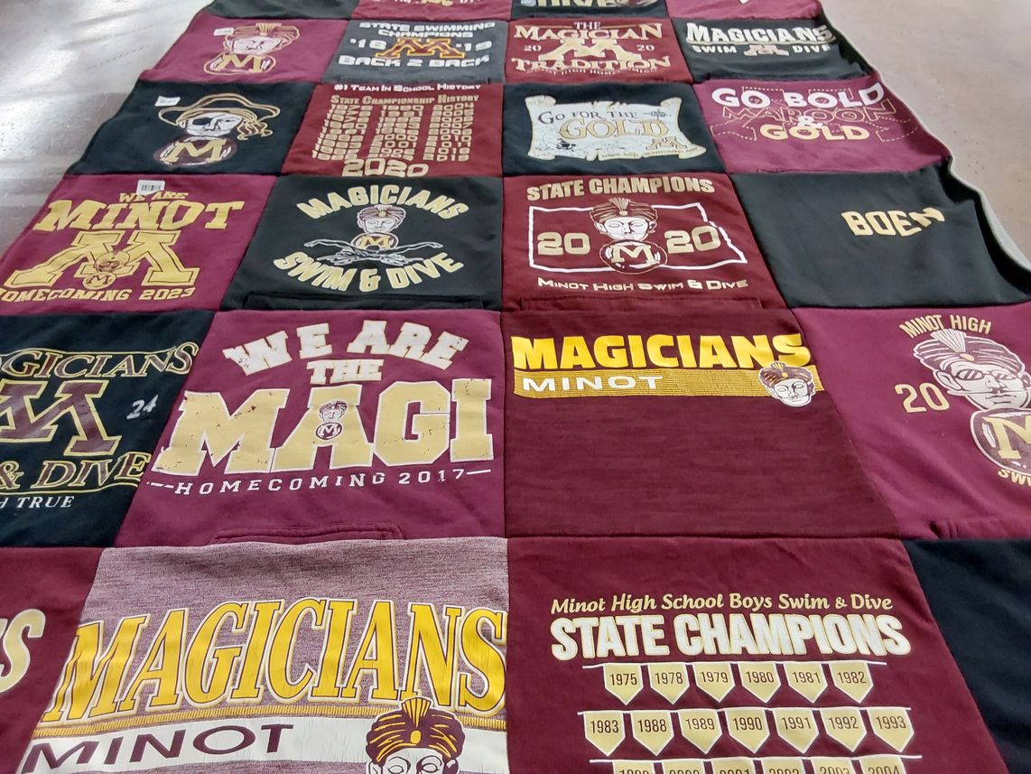 T-shirt quilt featuring minot high school swim and dive by Kristen from ND