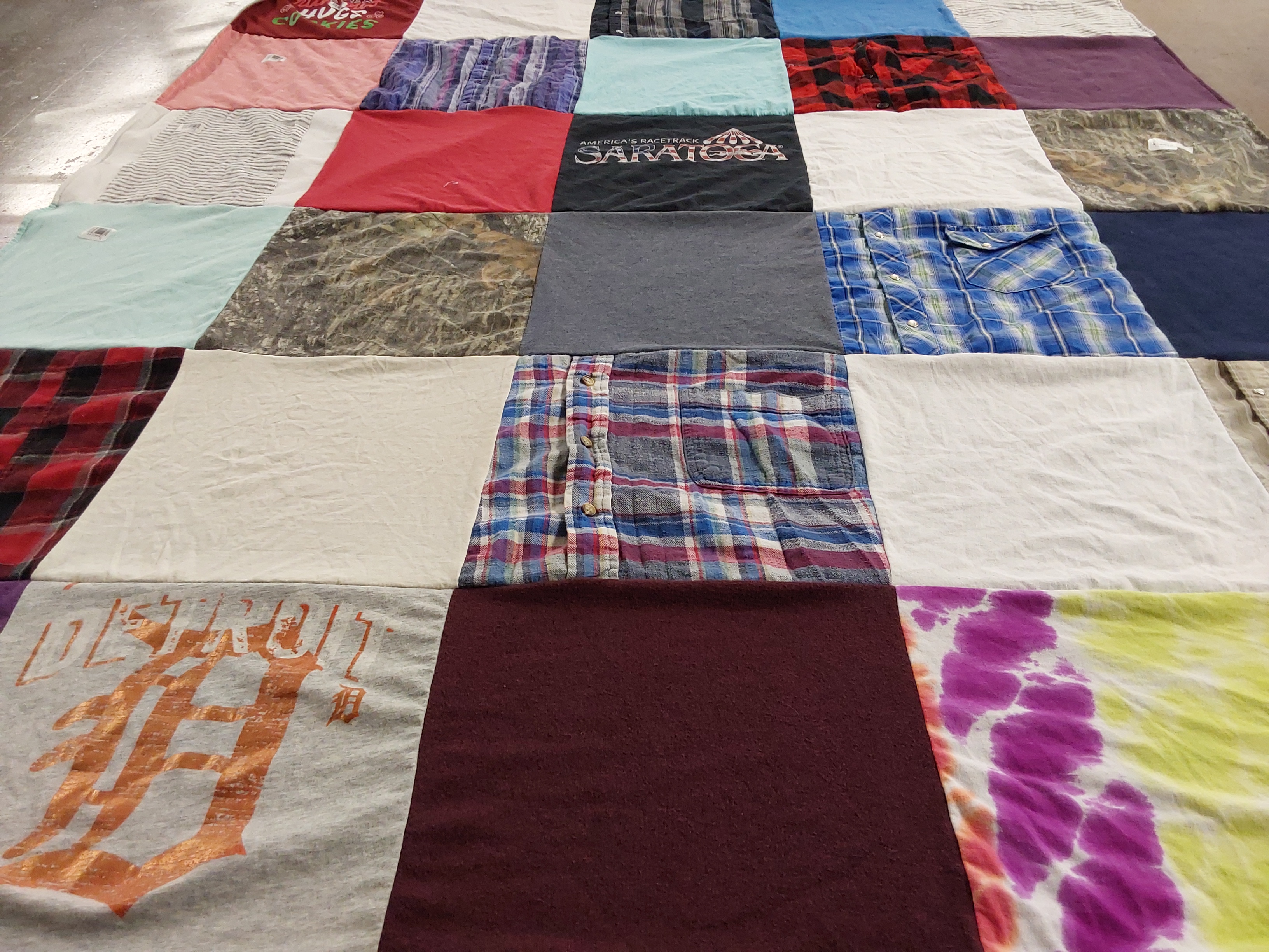 T-shirt quilt with sports, fashion themes by michelle from MI