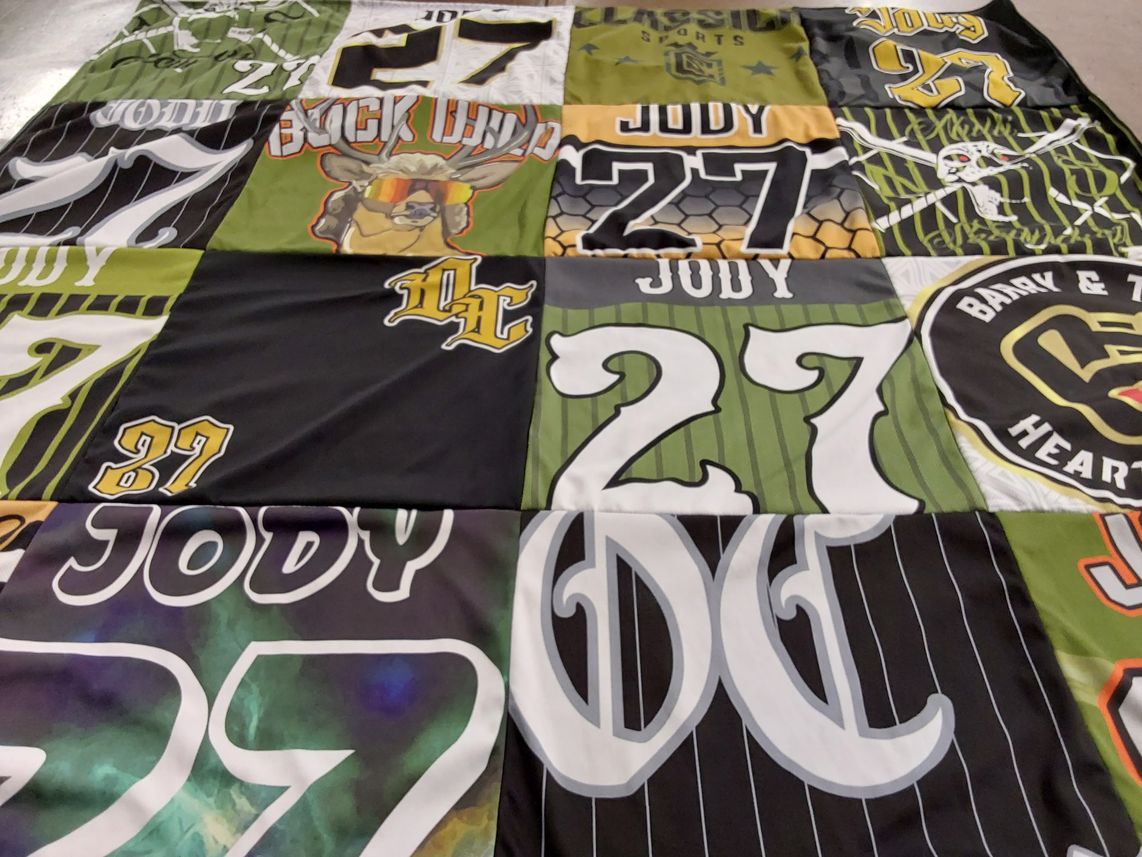 T-shirt quilt with sports themes by Raymond from CA