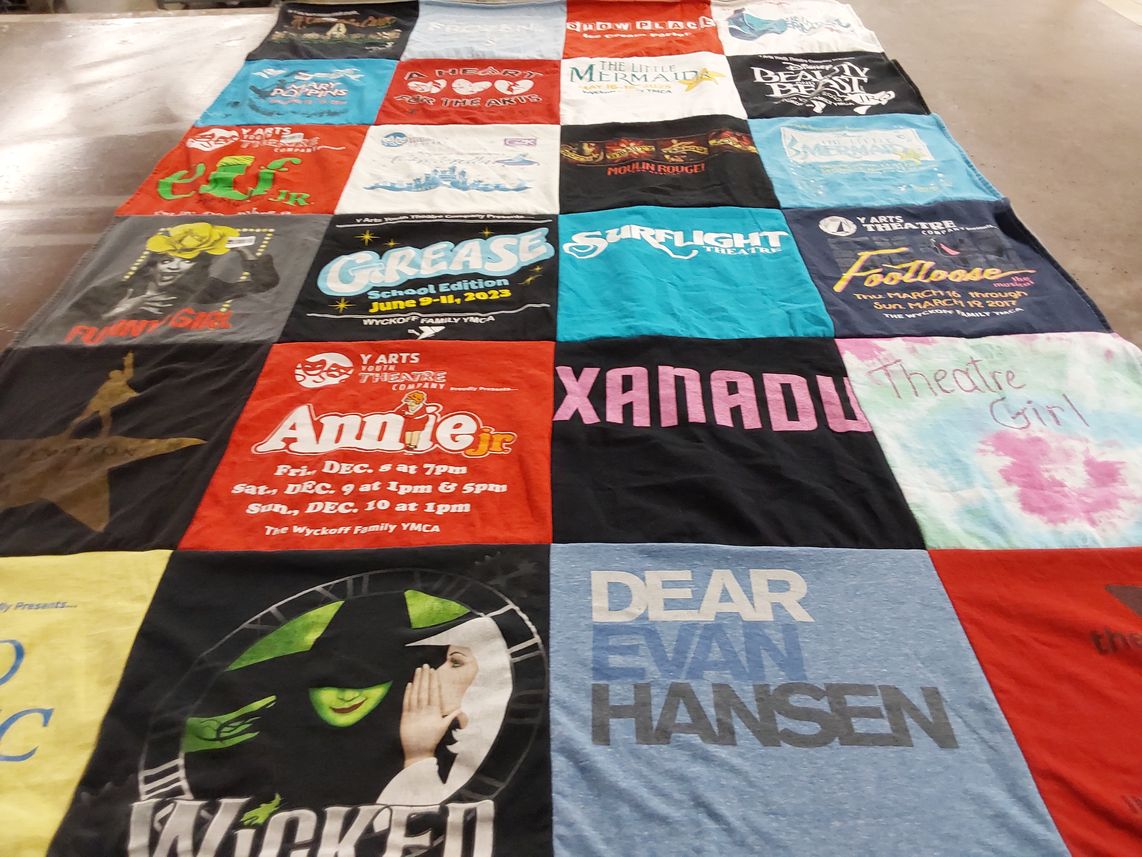 T-shirt quilt with theatre, musicals themes by Deborah from NJ