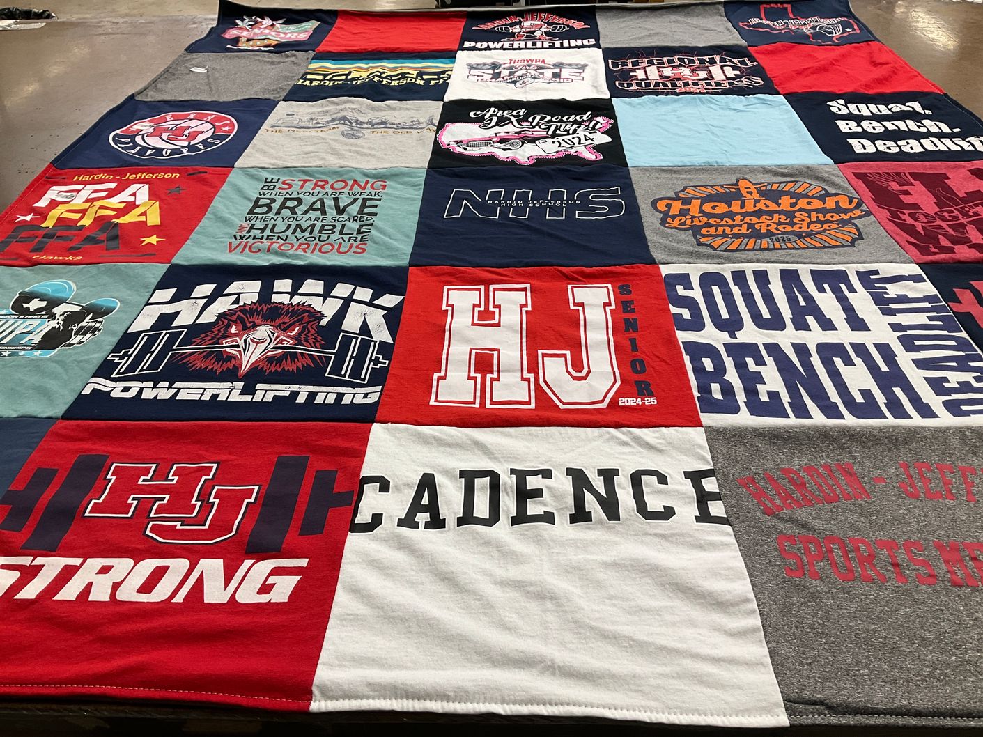 T-shirt quilt featuring hawk powerlifting by Emily from TX