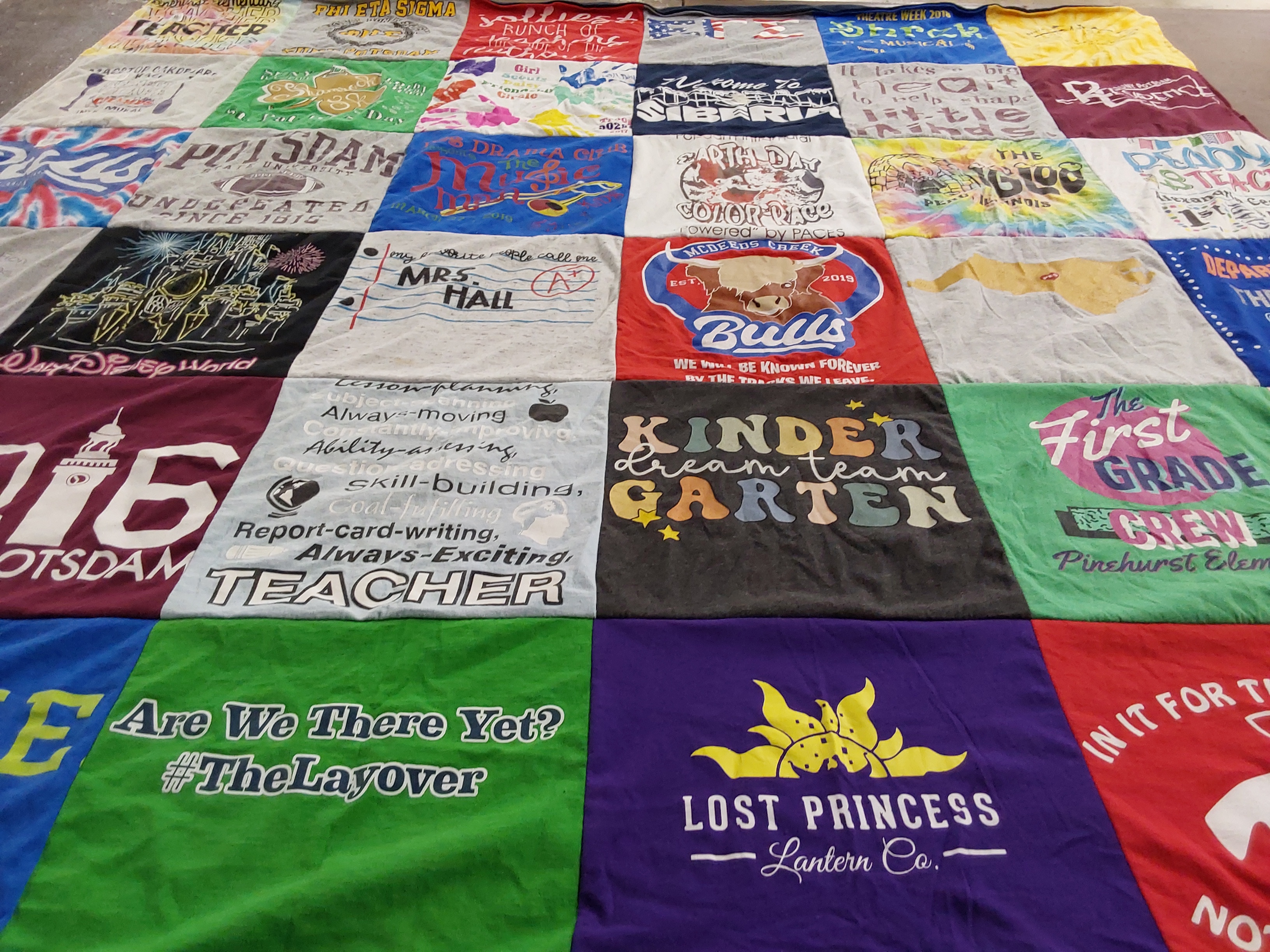 T-shirt quilt featuring messenger creek bulls by Marisa from NC