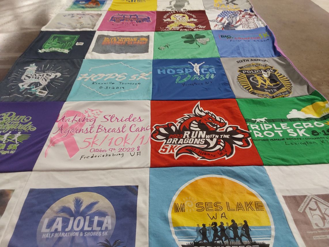 T-shirt quilt with charity, running themes by Ann from GA