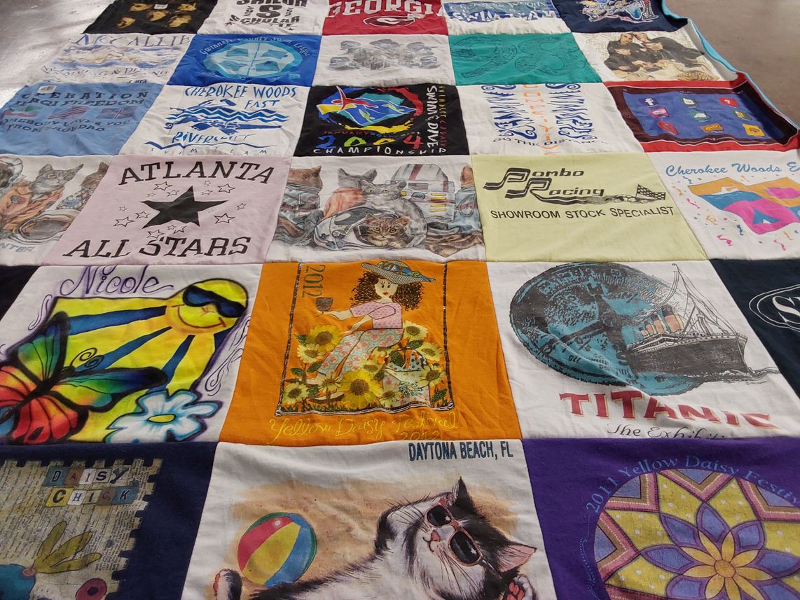 T-shirt quilt with sports, racing themes by Denise from GA