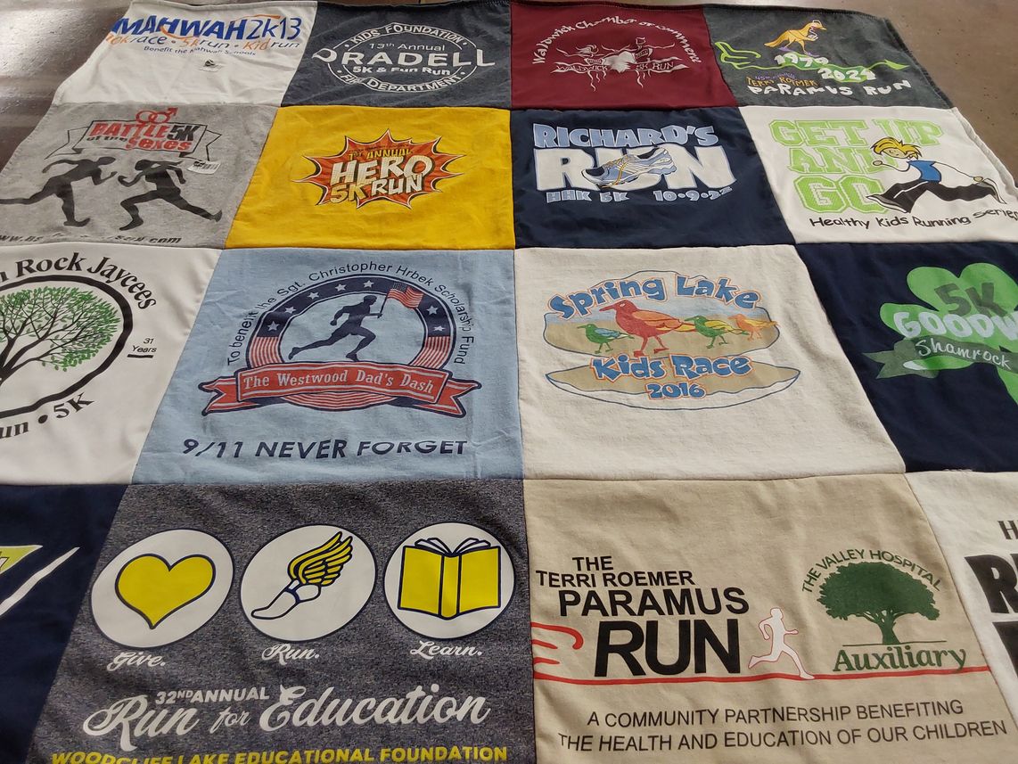 T-shirt quilt with running, community service themes by Carol from NJ