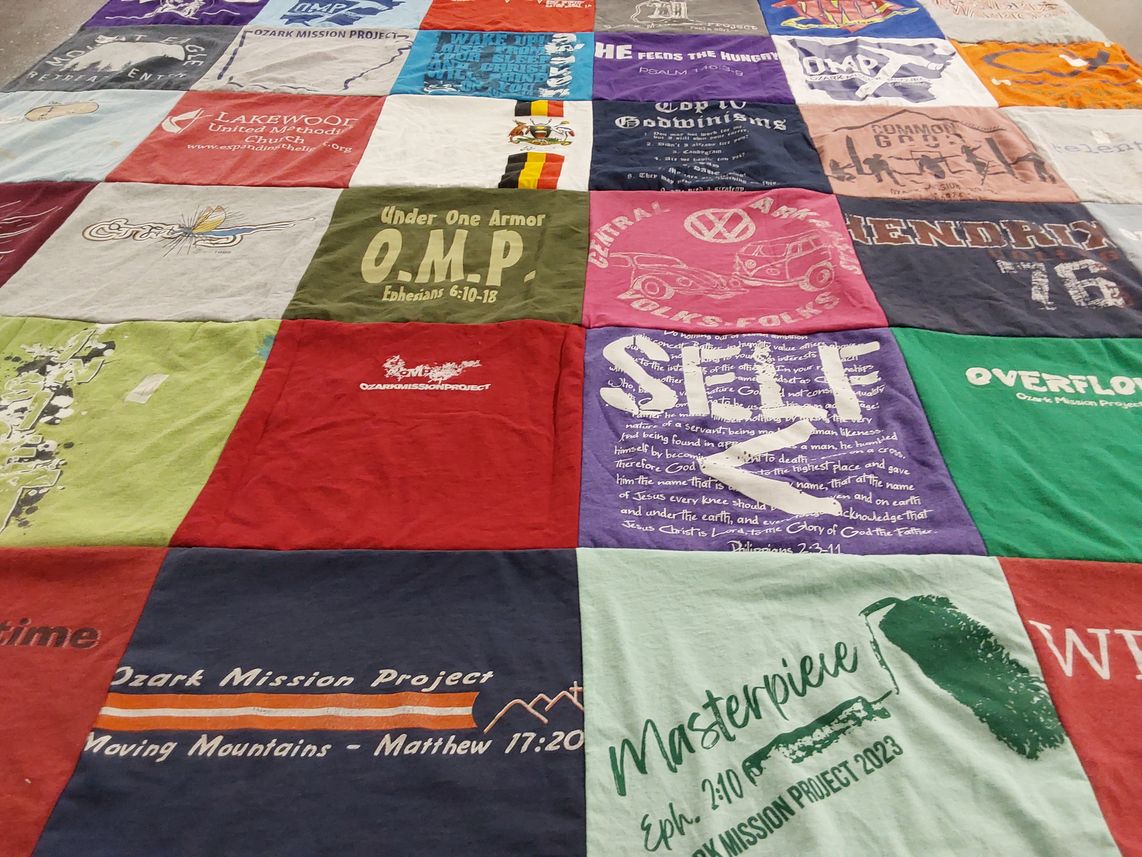 T-shirt quilt with mission work, community service themes by Willard from AR