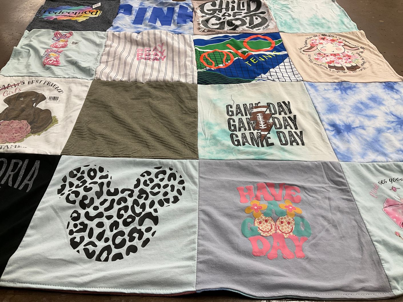 T-shirt quilt with sports, animals themes by Andrea from FL