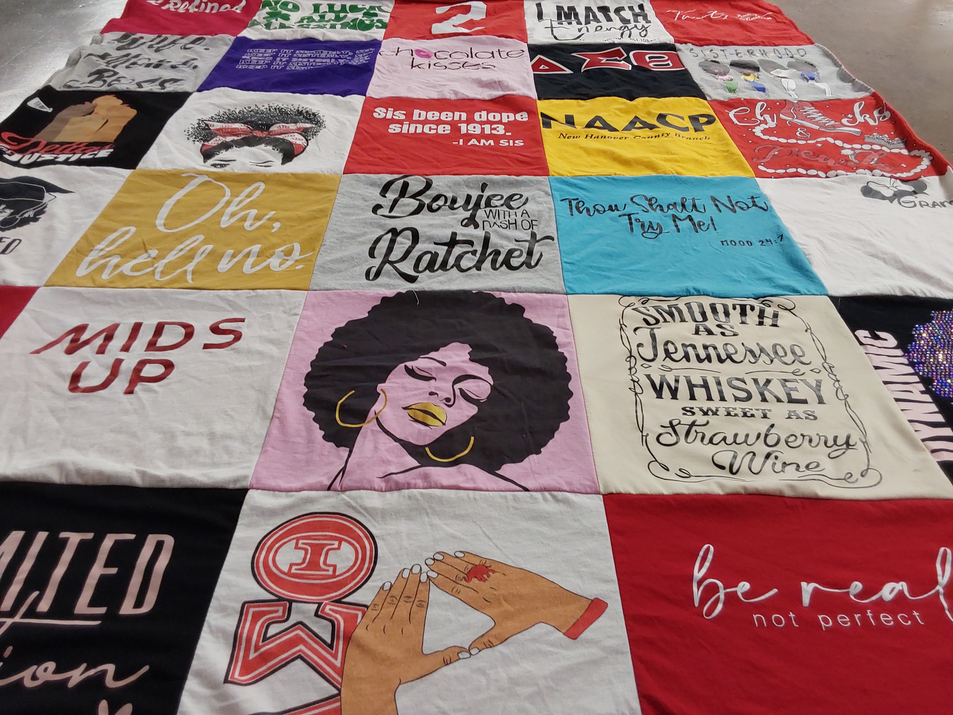 T-shirt quilt with sisterhood, empowerment themes by Wanda from NC