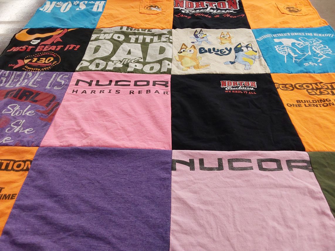 T-shirt quilt with family, community service themes by DeAnna from IL