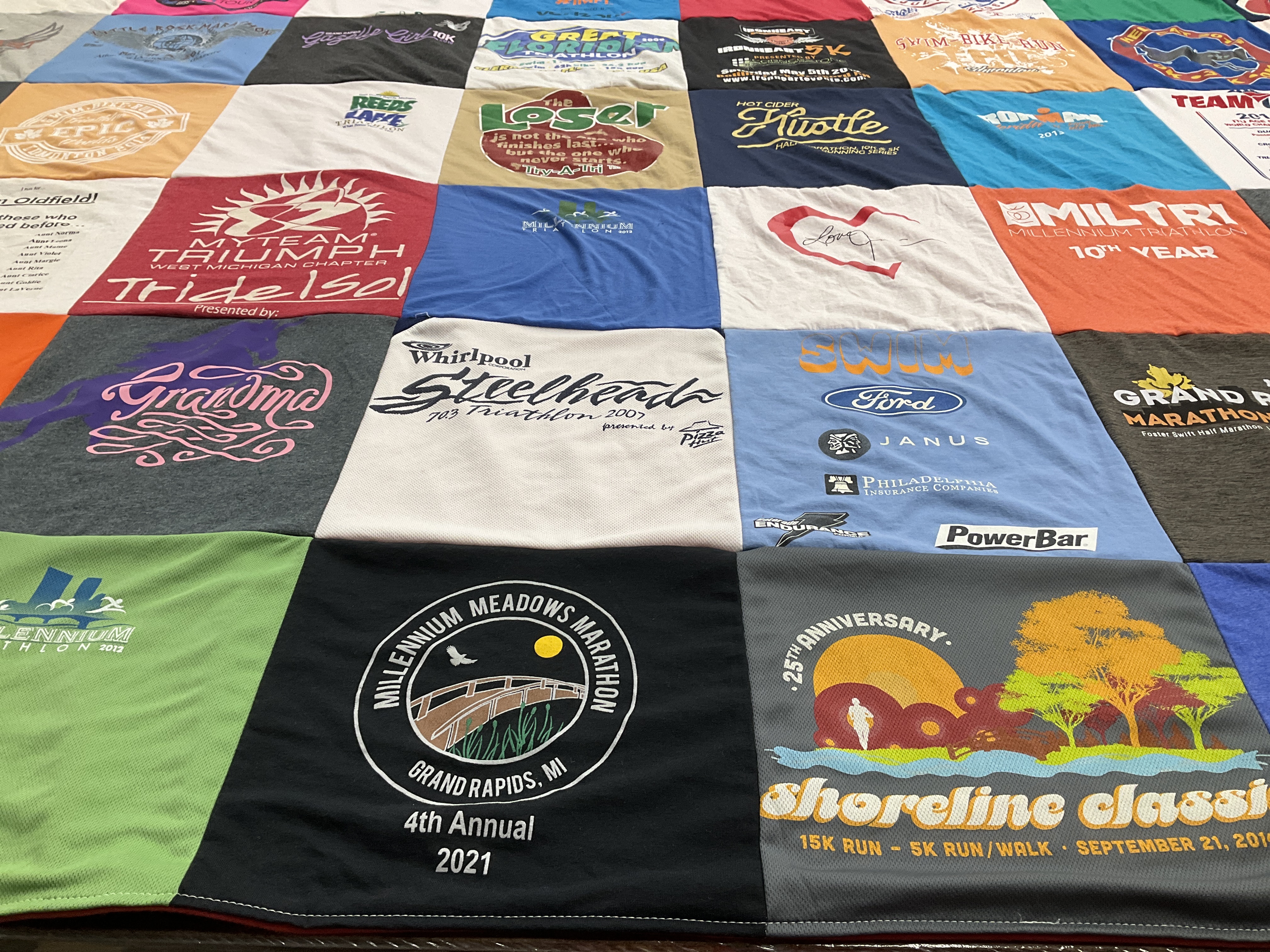 T-shirt quilt with running, triathlon themes by Deb from MI