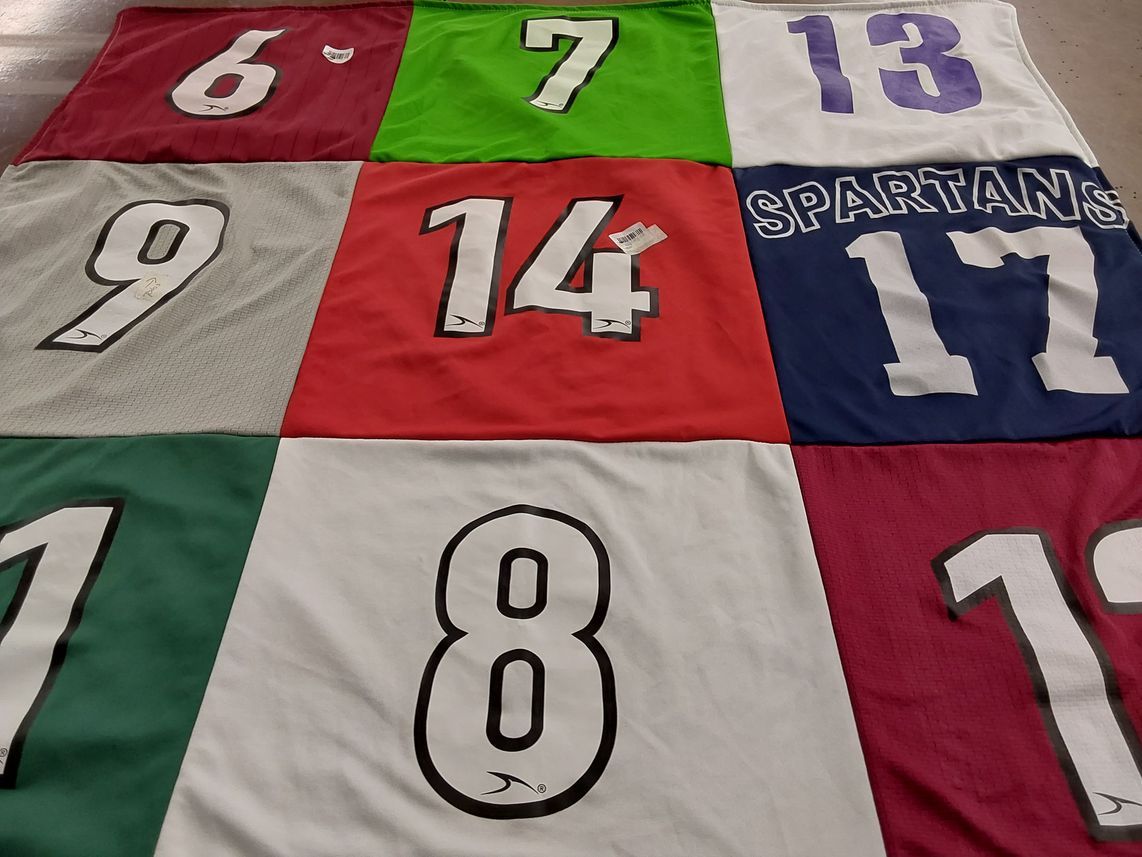 T-shirt quilt with sports, team spirit themes by Michelle from CA