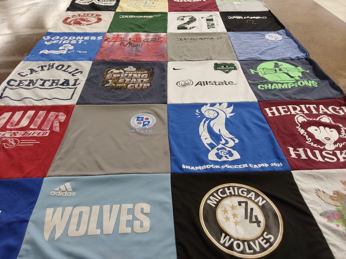 T-shirt quilt featuring michigan wolves by Maria from MI