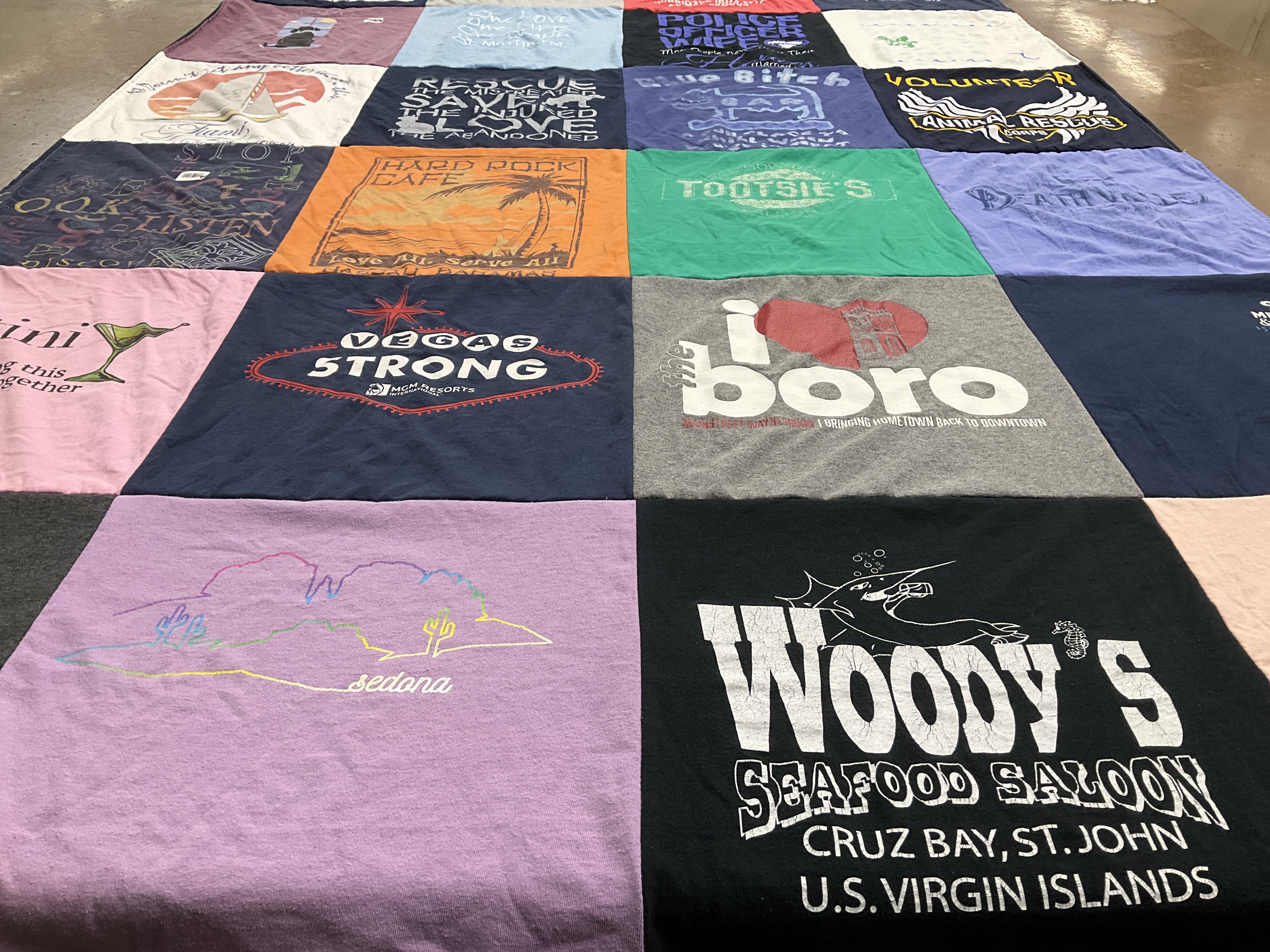 T-shirt quilt with vegas, animal rescue themes by Kelly from MD