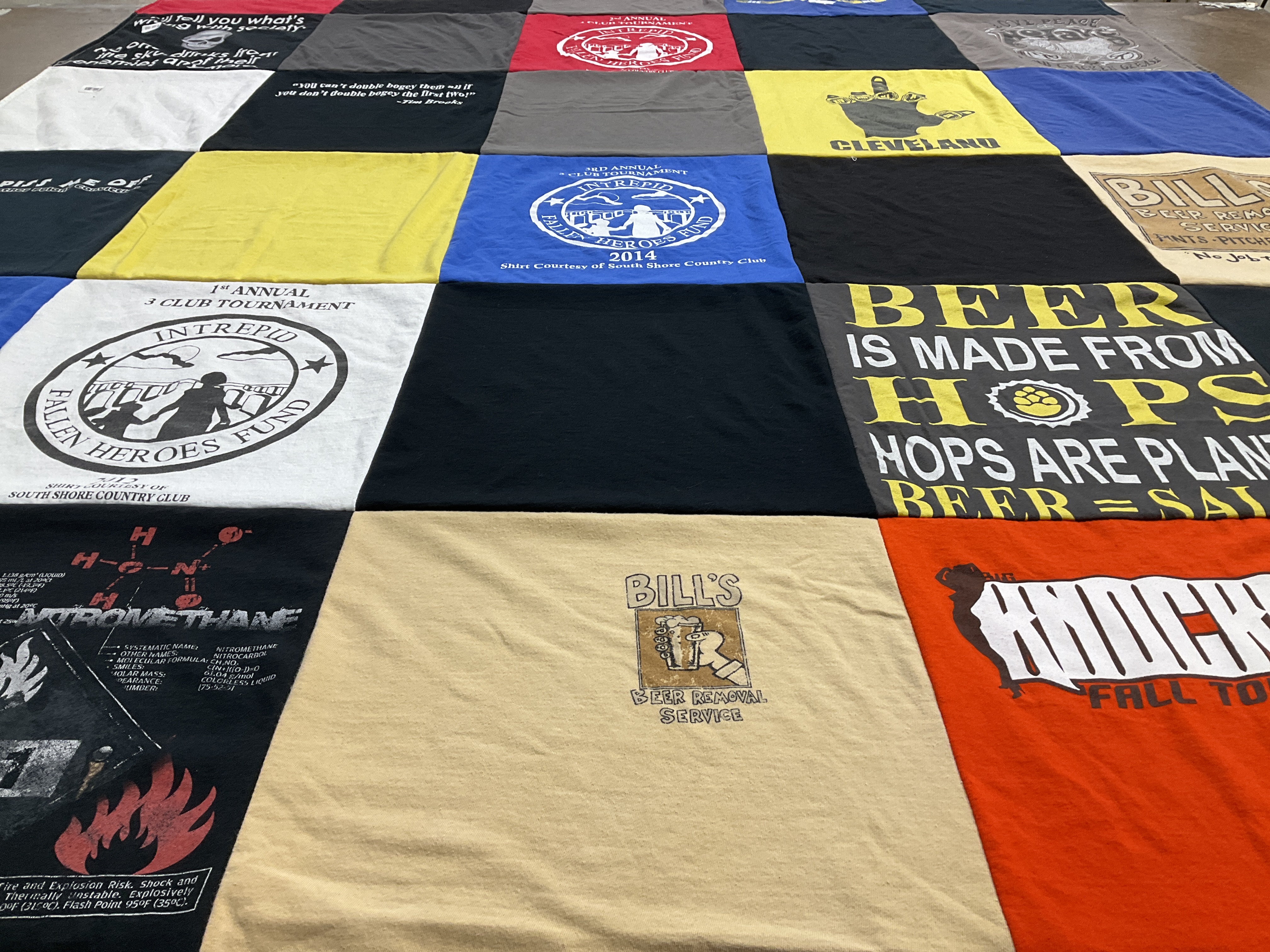 T-shirt quilt with beer brewing, community events themes by Martha Willy from IN
