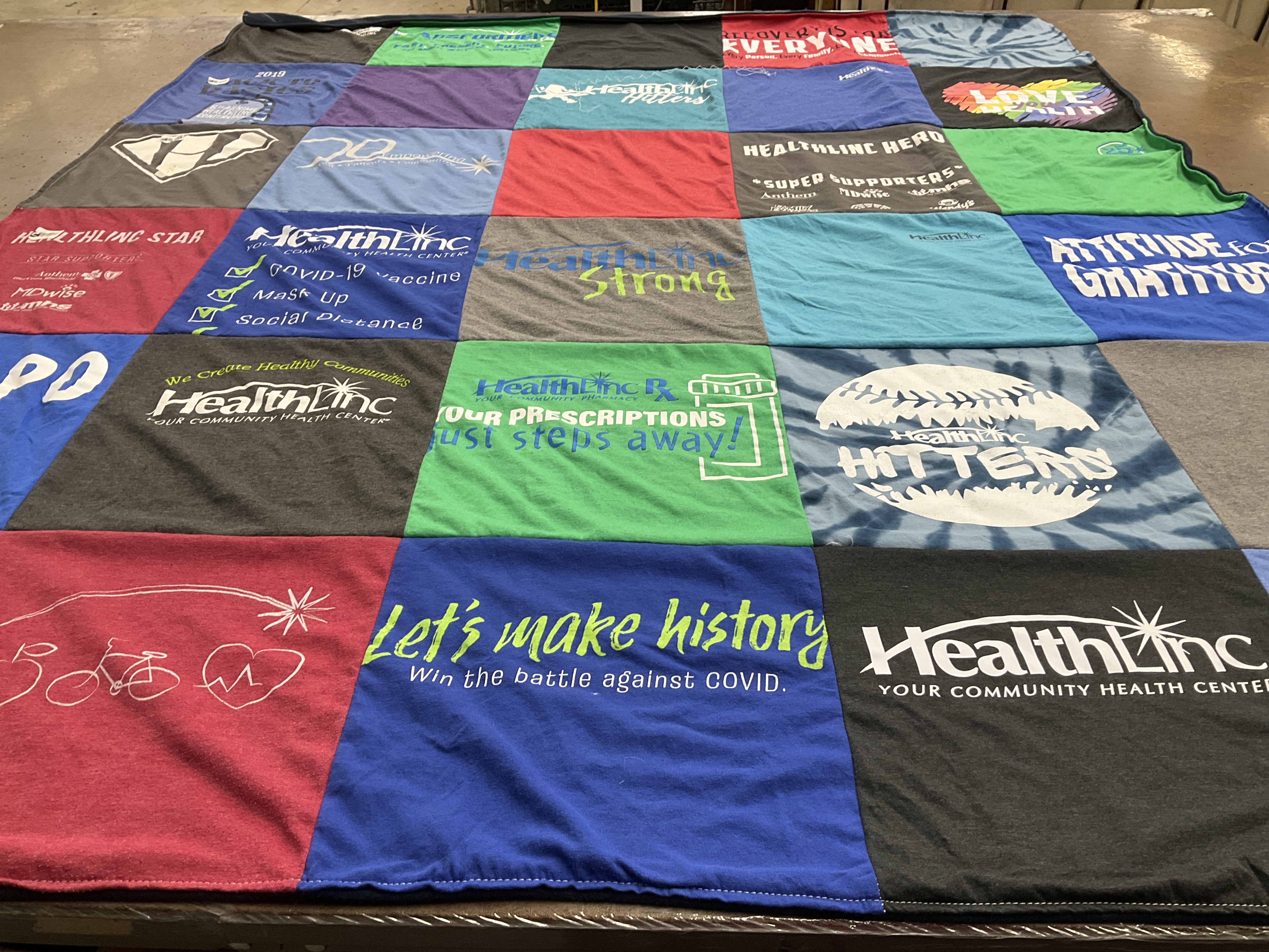 T-shirt quilt with health, community themes by Asha from IN
