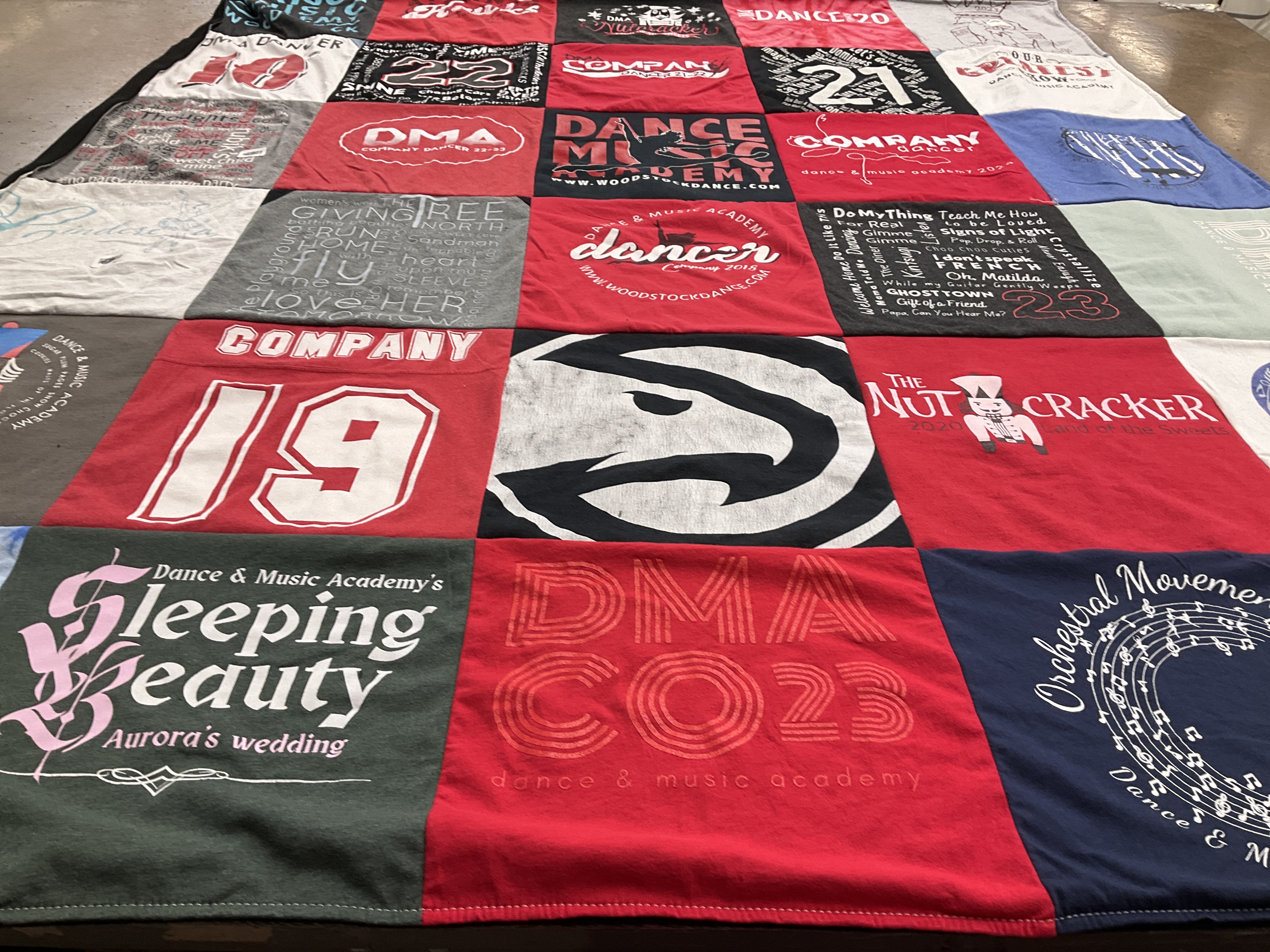 T-shirt quilt with dance, music themes by Olga from GA