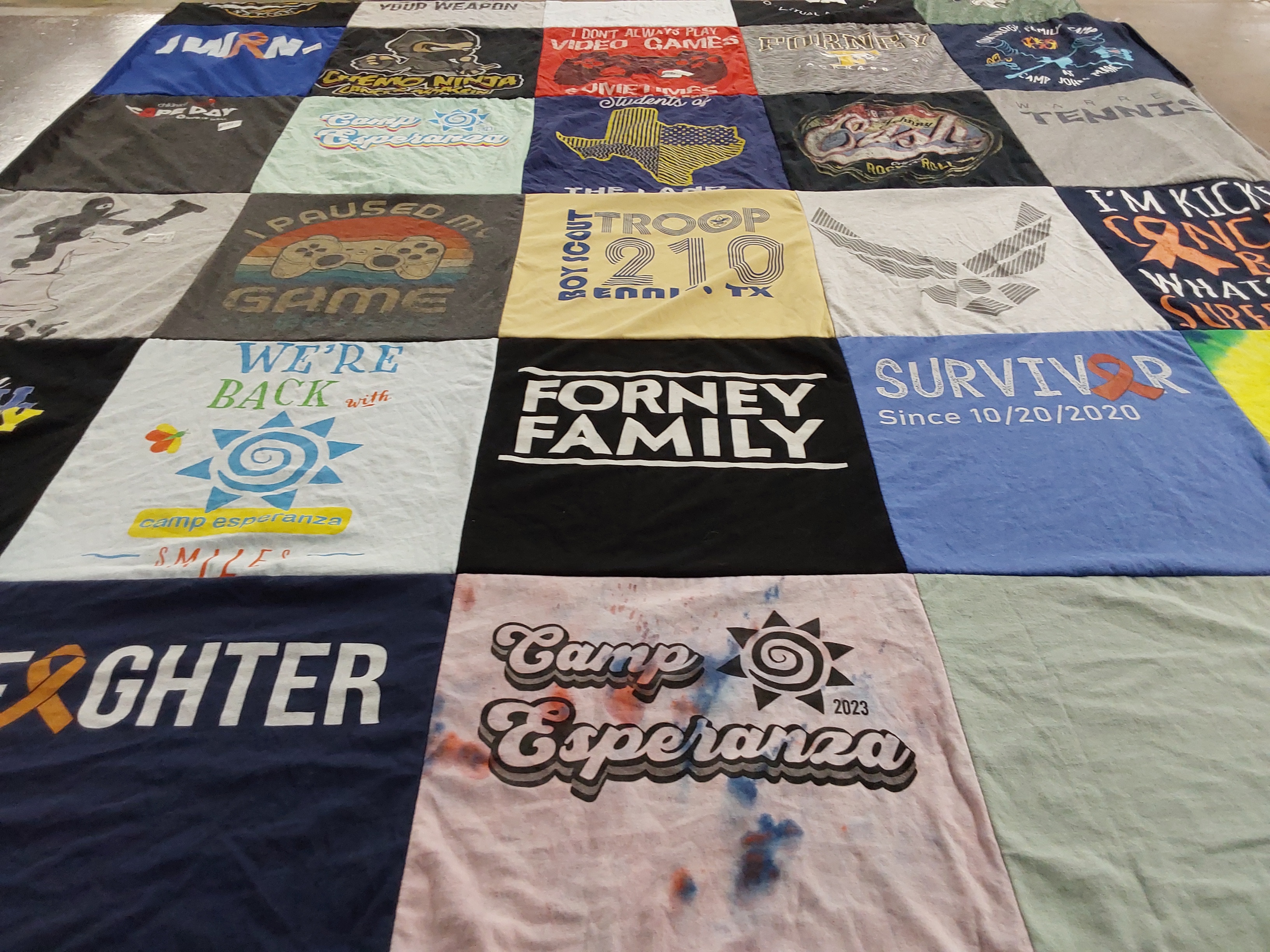 T-shirt quilt with video games, camping themes by Kristin from TX