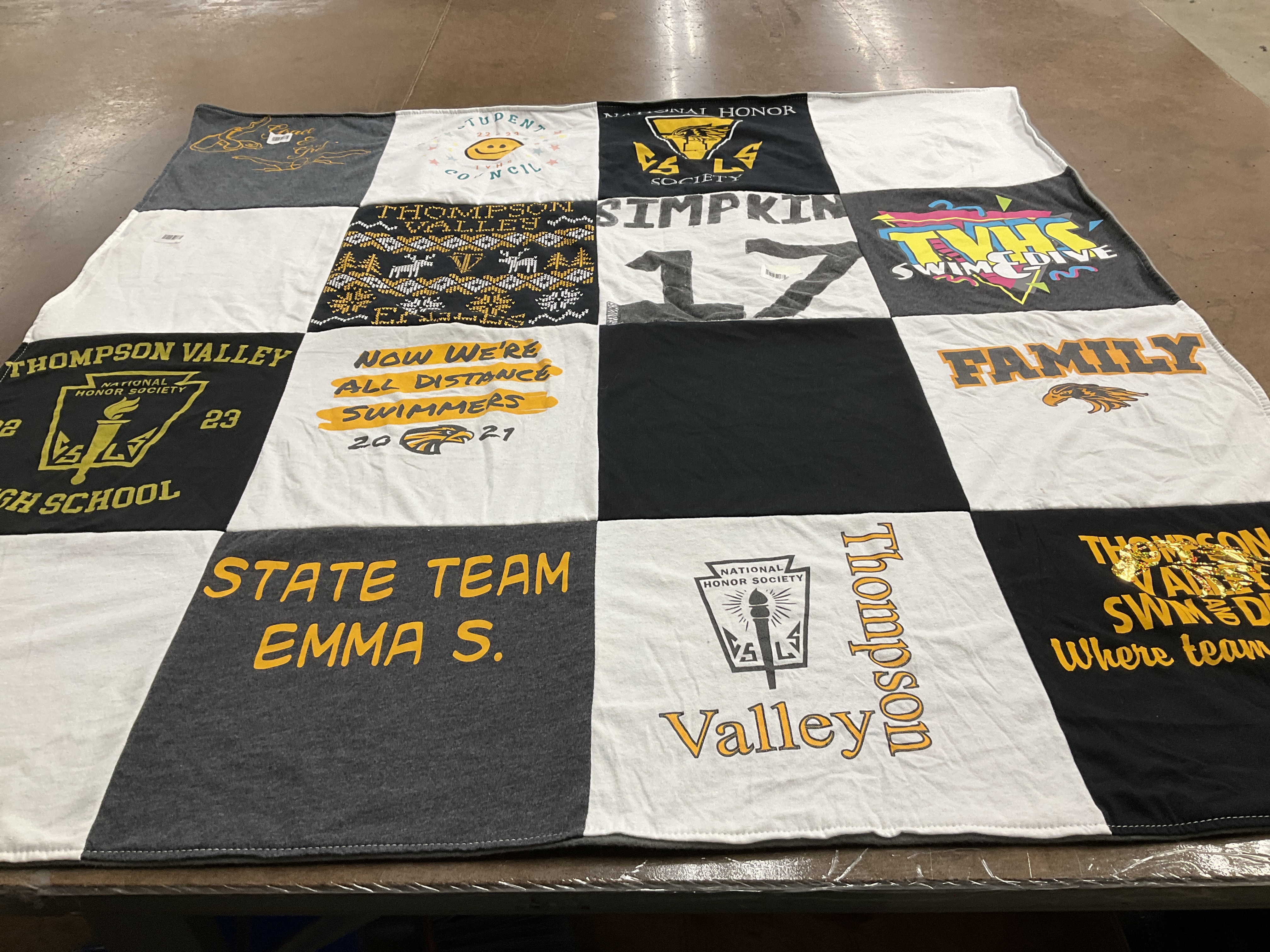 T-shirt quilt featuring thompson valley swim team by Tess from CO