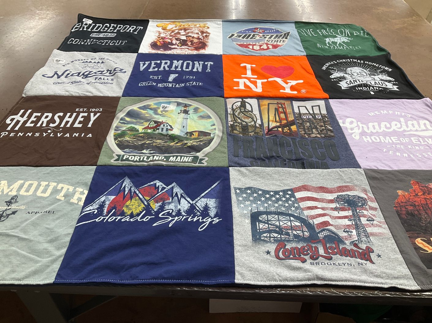 T-shirt quilt with travel, tourism themes by Faye from SC