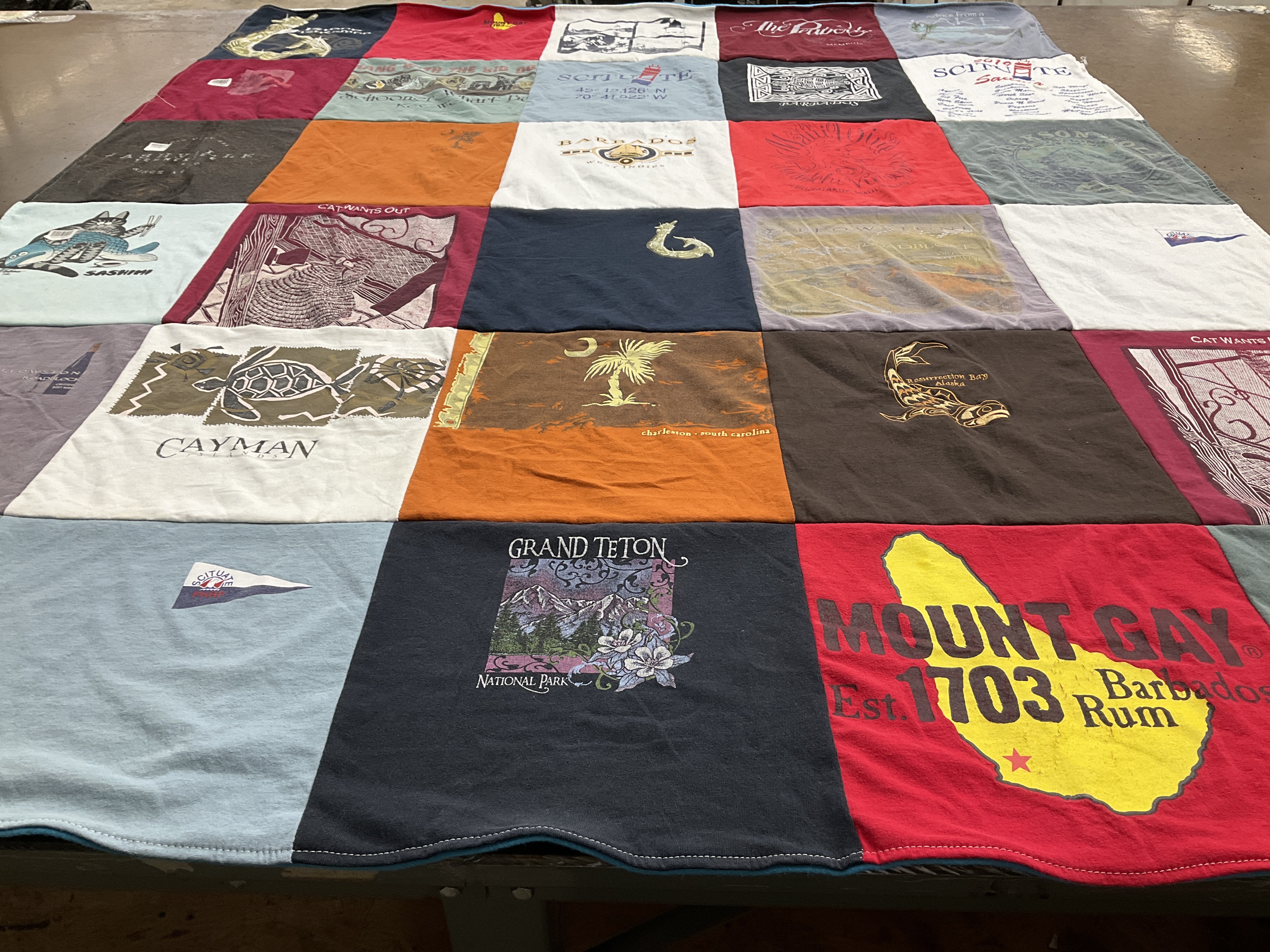 T-shirt quilt with travel, souvenirs themes by Karen from MA