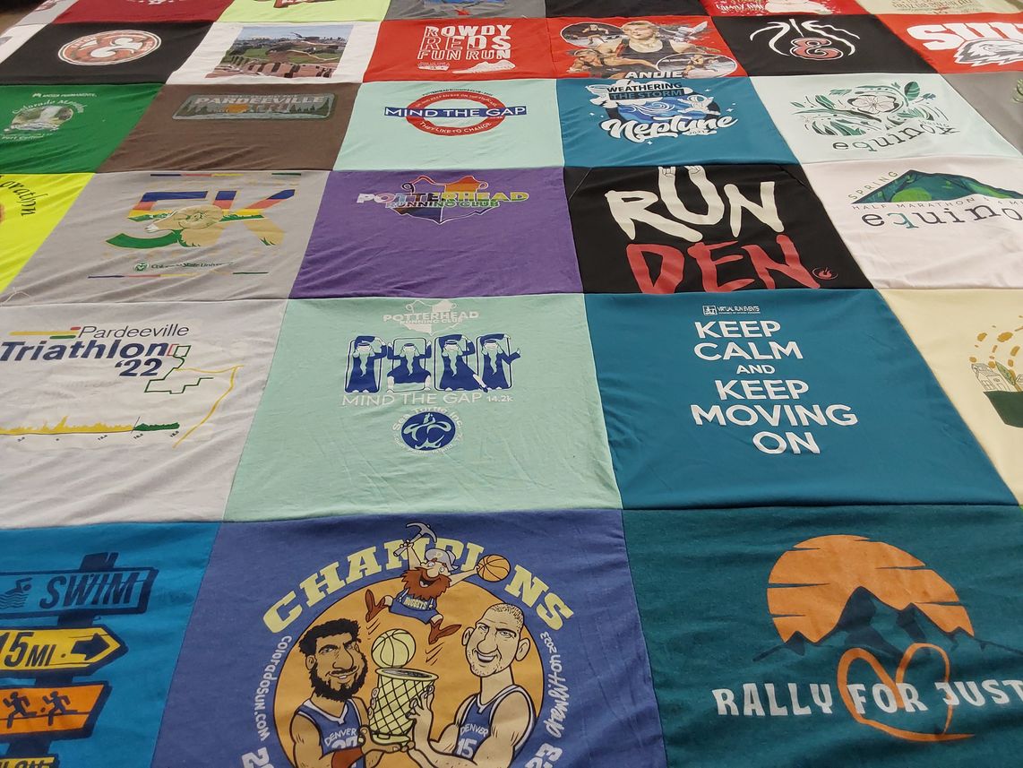 T-shirt quilt with sports, running themes by Terry from CO