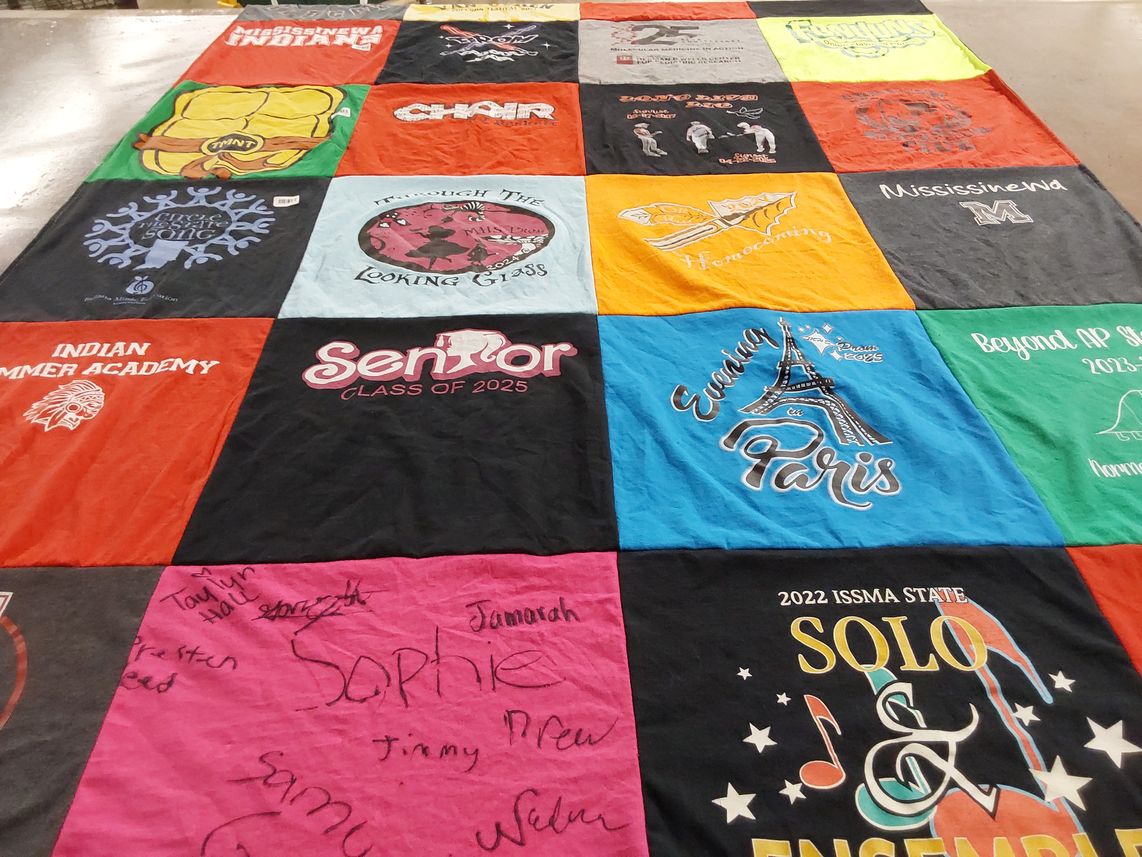 T-shirt quilt with music, graduation themes by Mary from IN