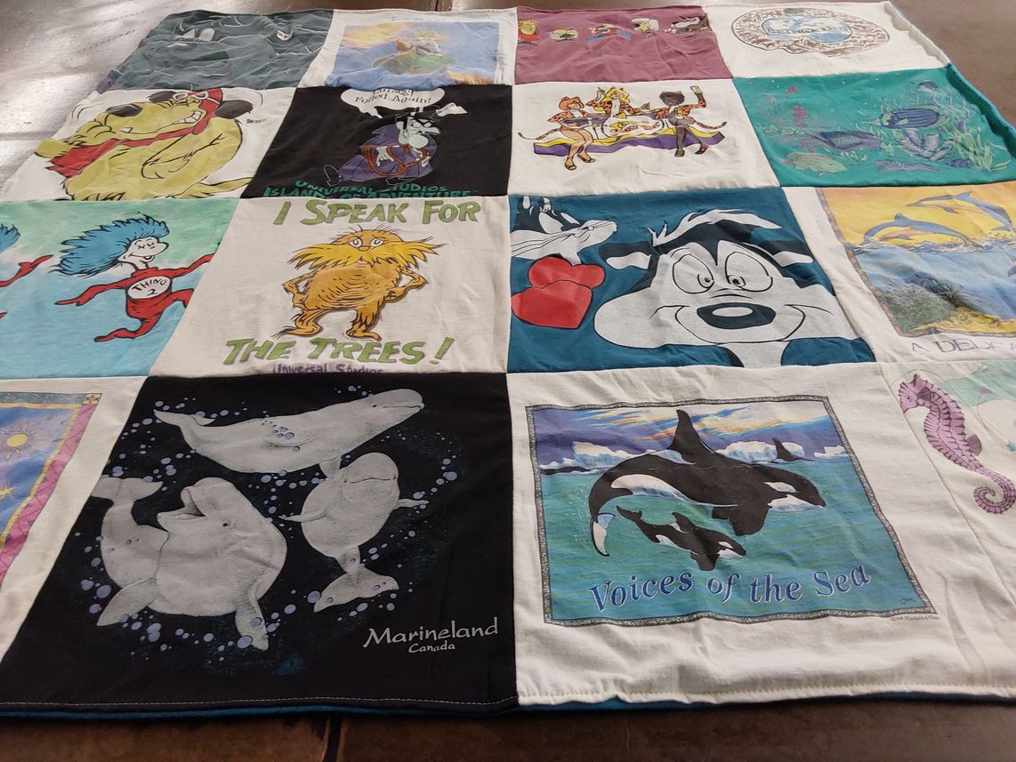 T-shirt quilt with marine life, environment themes by Claire from VA