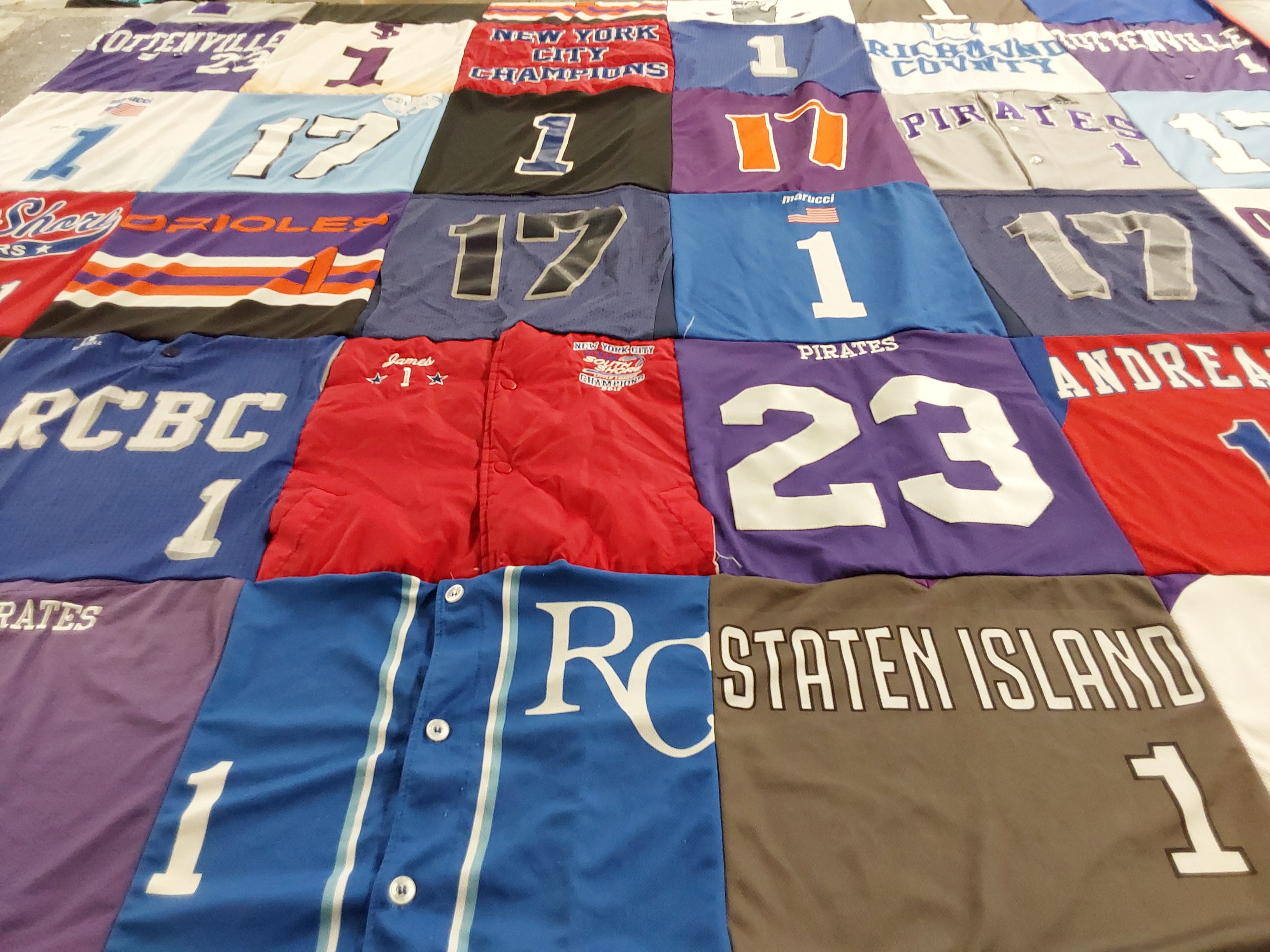 Custom Project Repat t-shirt quilt featuring shirts from richmond county college.